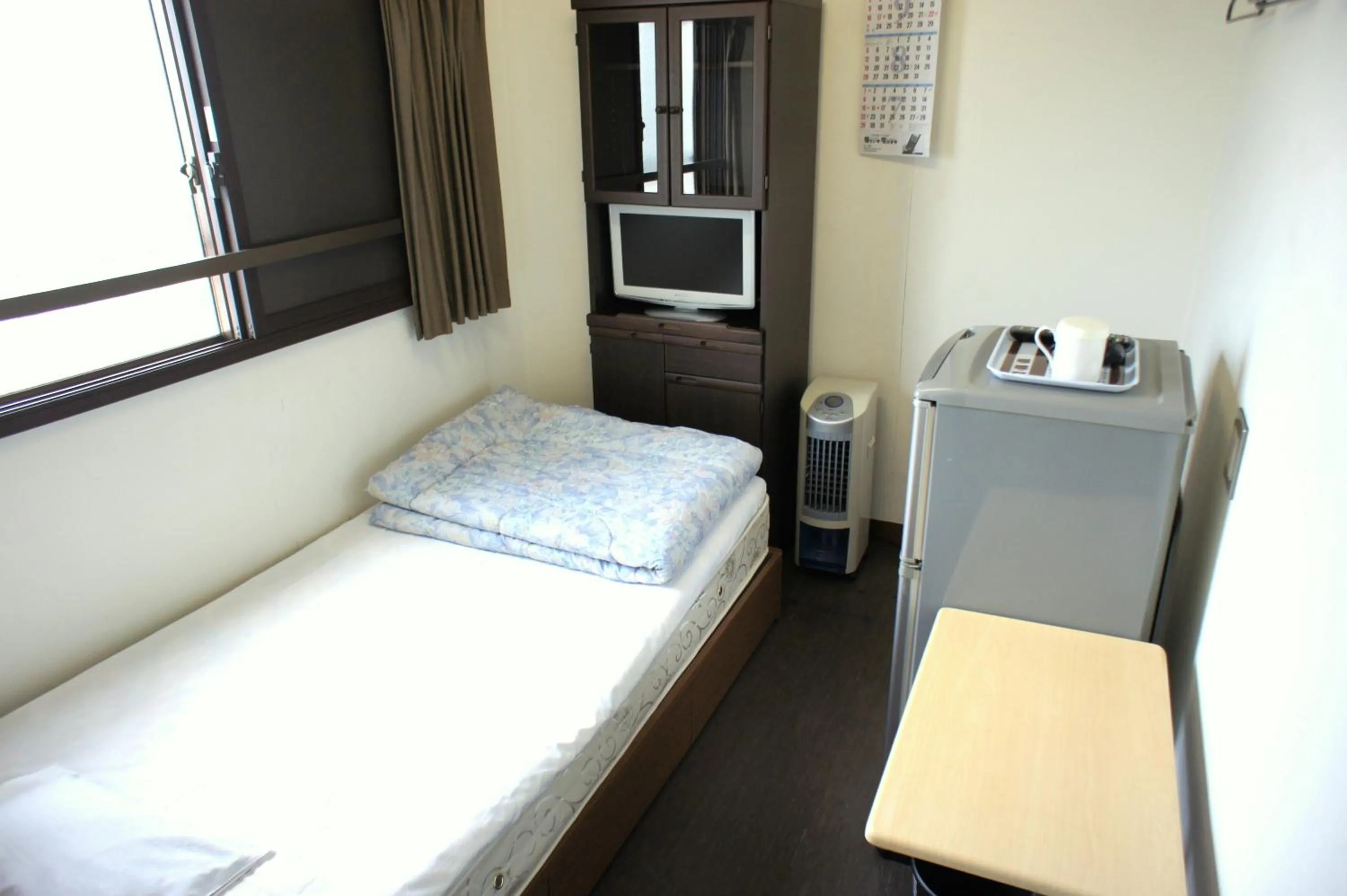 Photo of the whole room, Bed in Economy Hotel Hoteiya