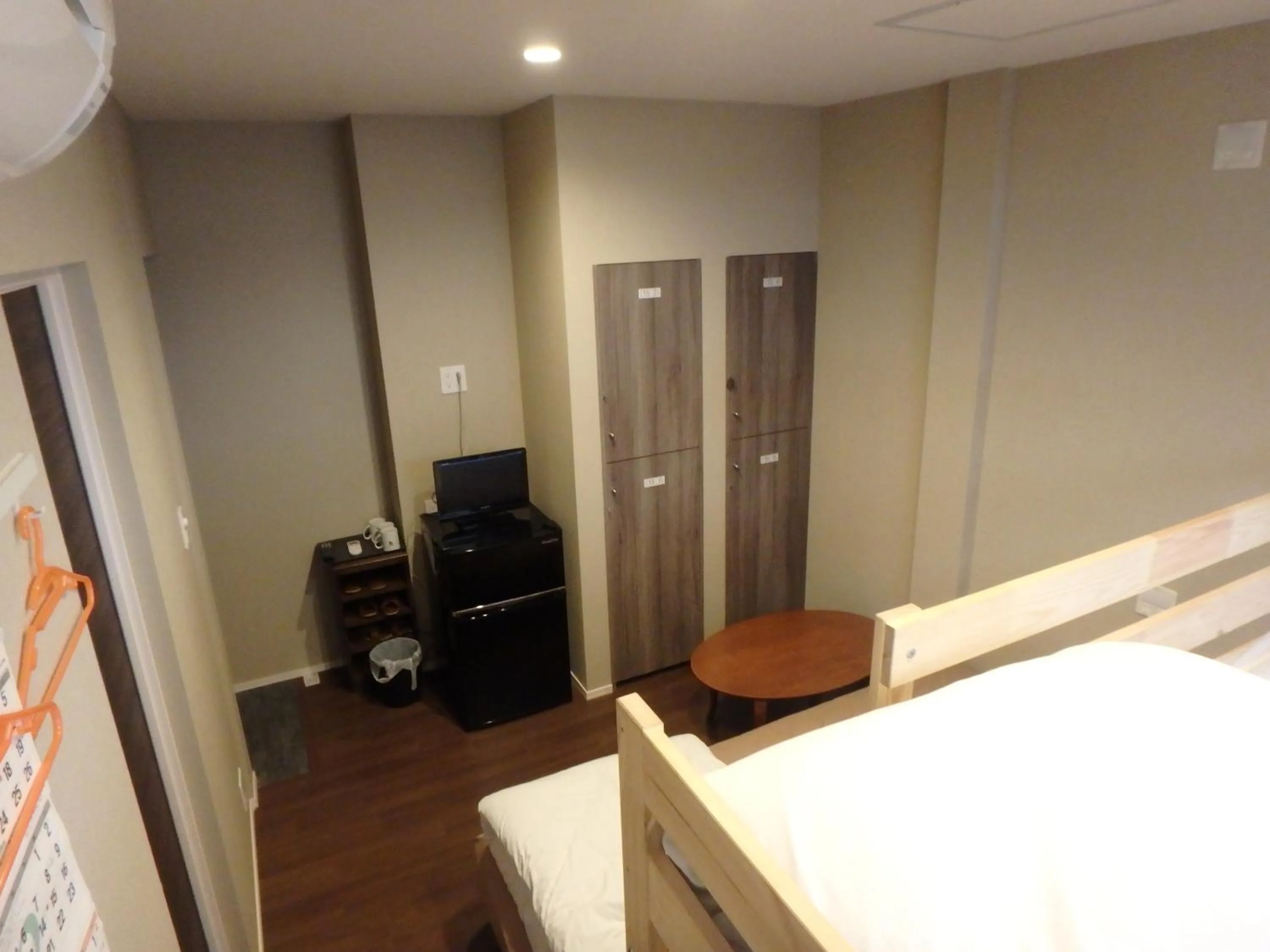 TV and multimedia, Bed in Economy Hotel Hoteiya