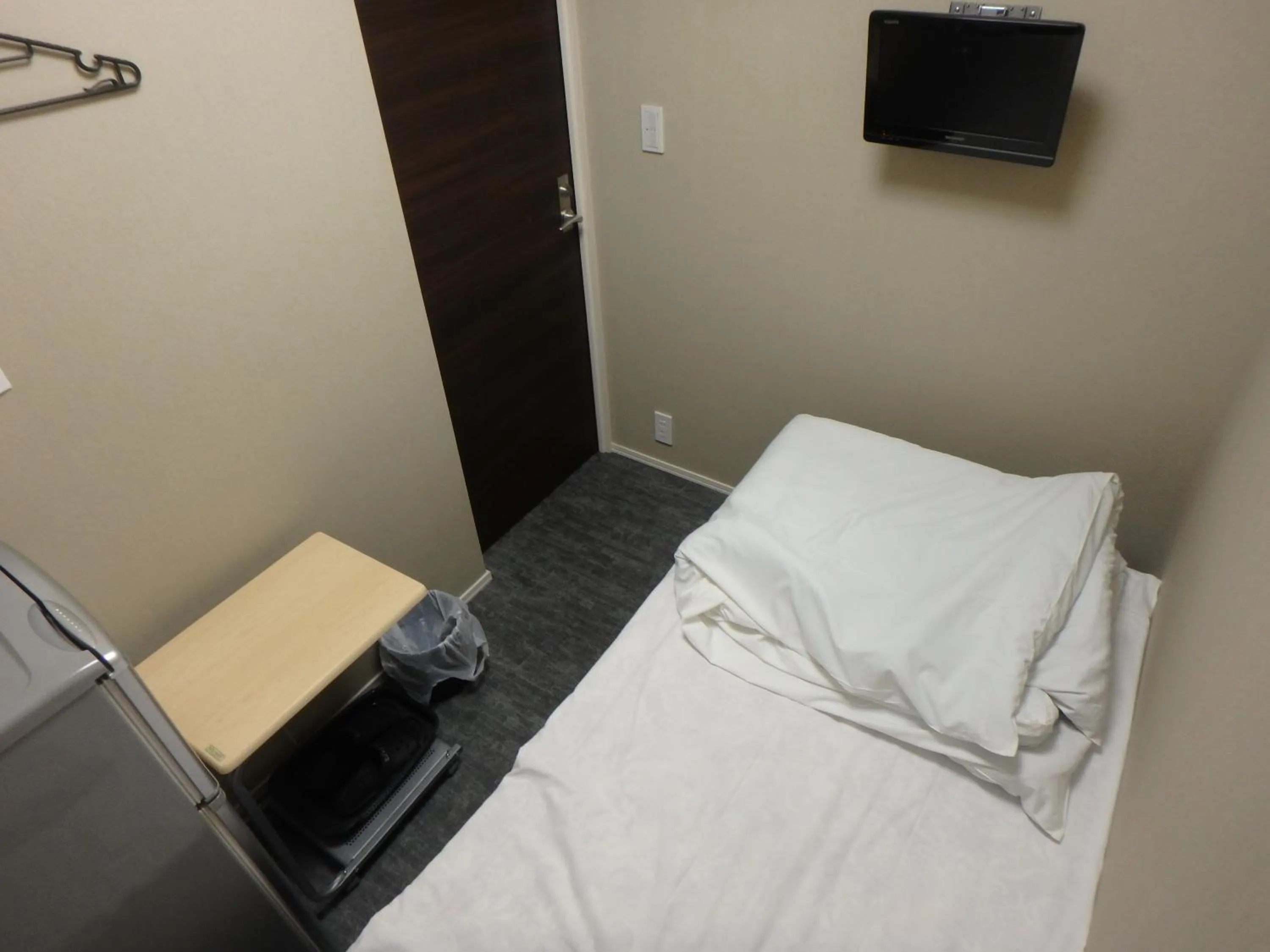 Bed in Economy Hotel Hoteiya