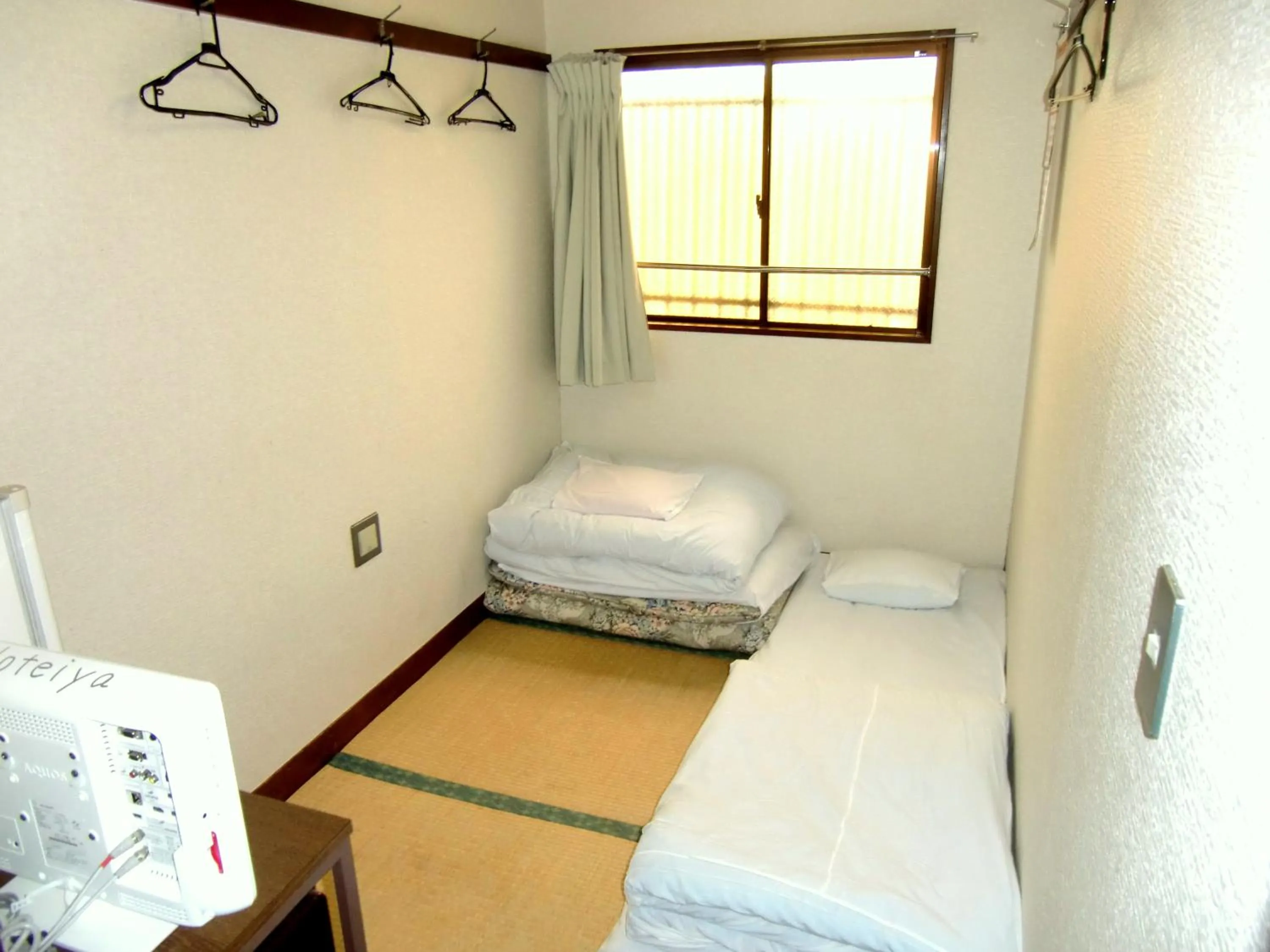 Photo of the whole room, Bed in Economy Hotel Hoteiya