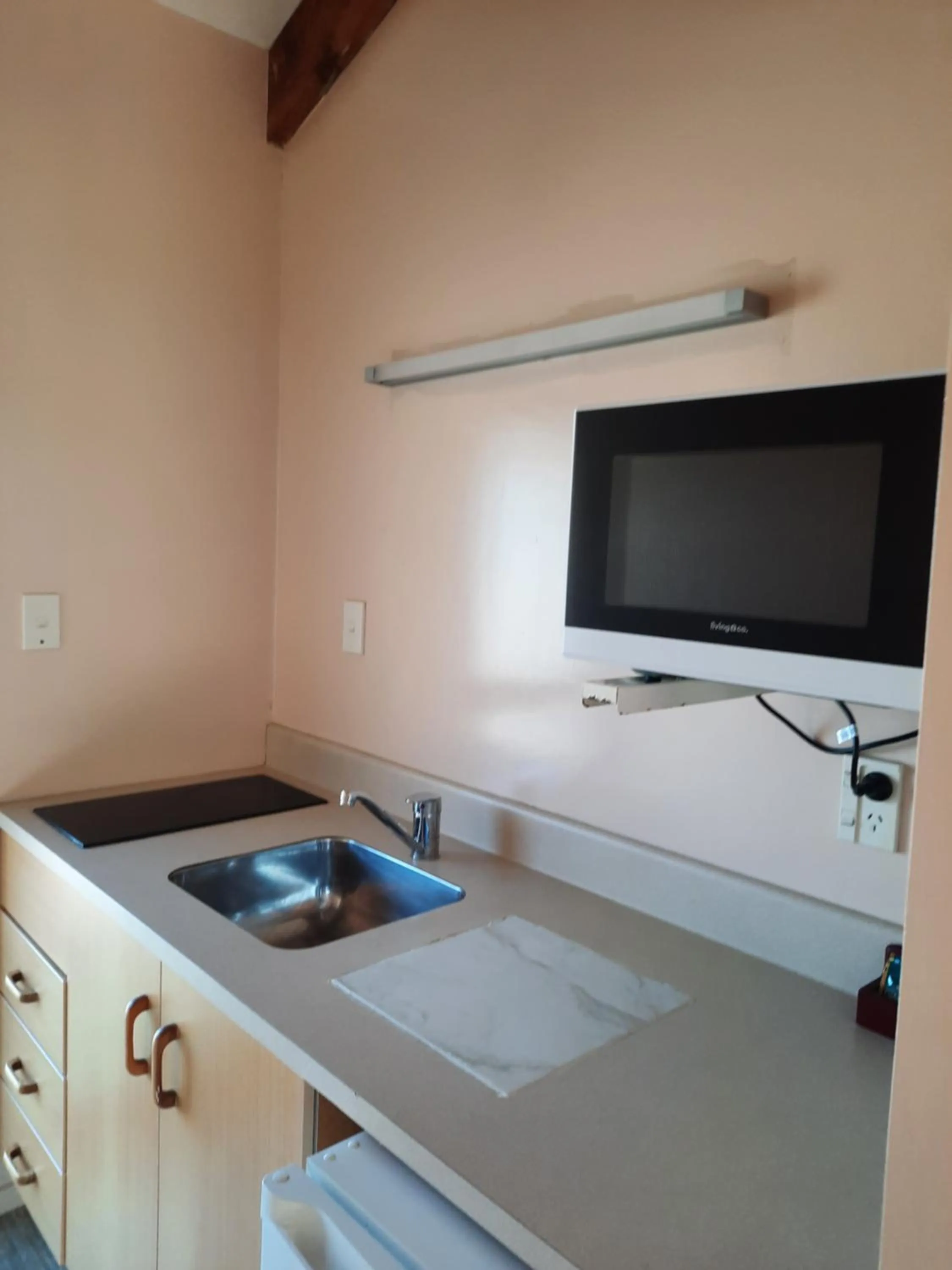 Kitchen or kitchenette in Alfa Boutique Motel