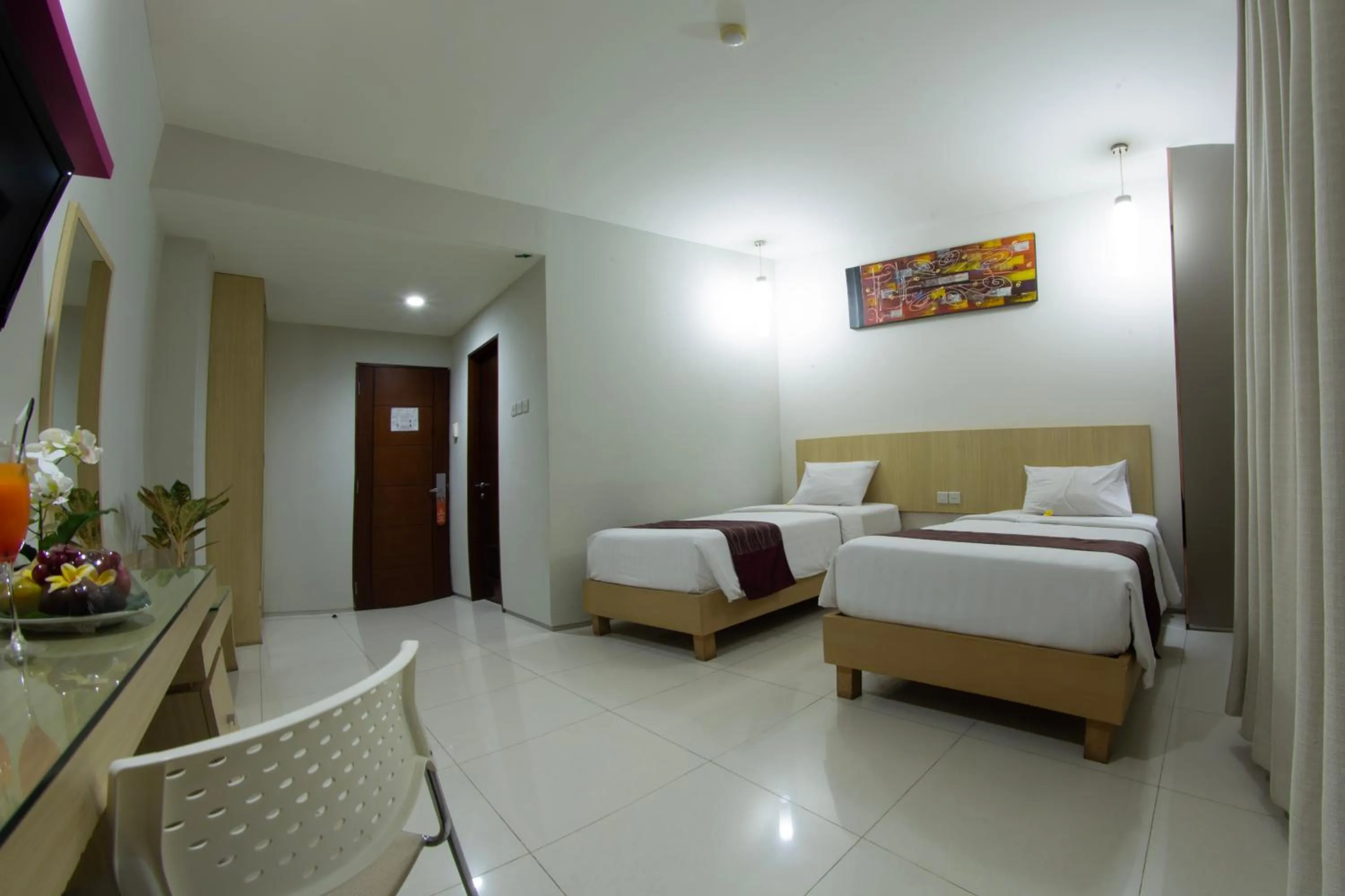 Bed in Lombok Plaza Hotel and Convention