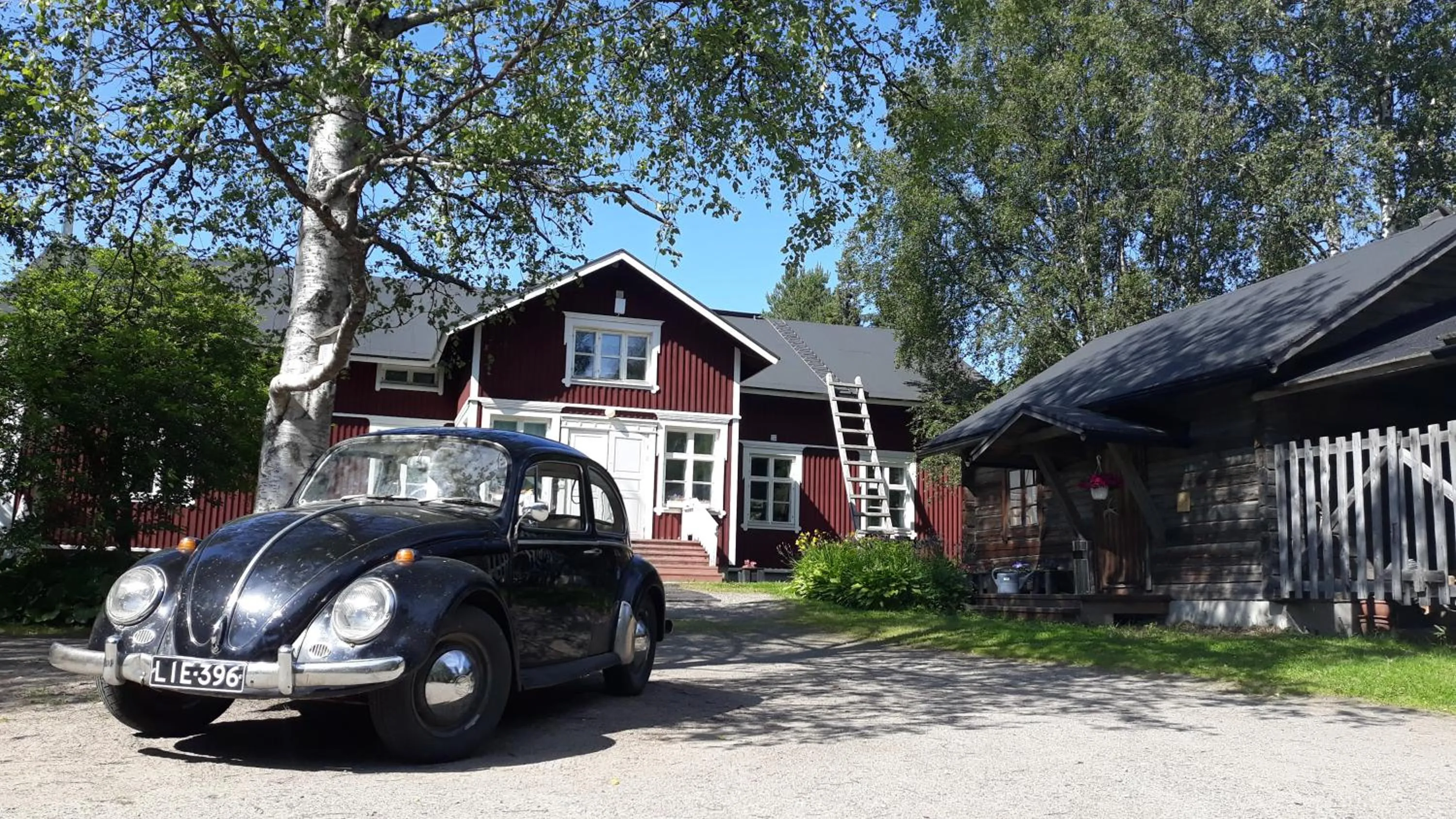 Summer in LAURI Historical Log House Manor