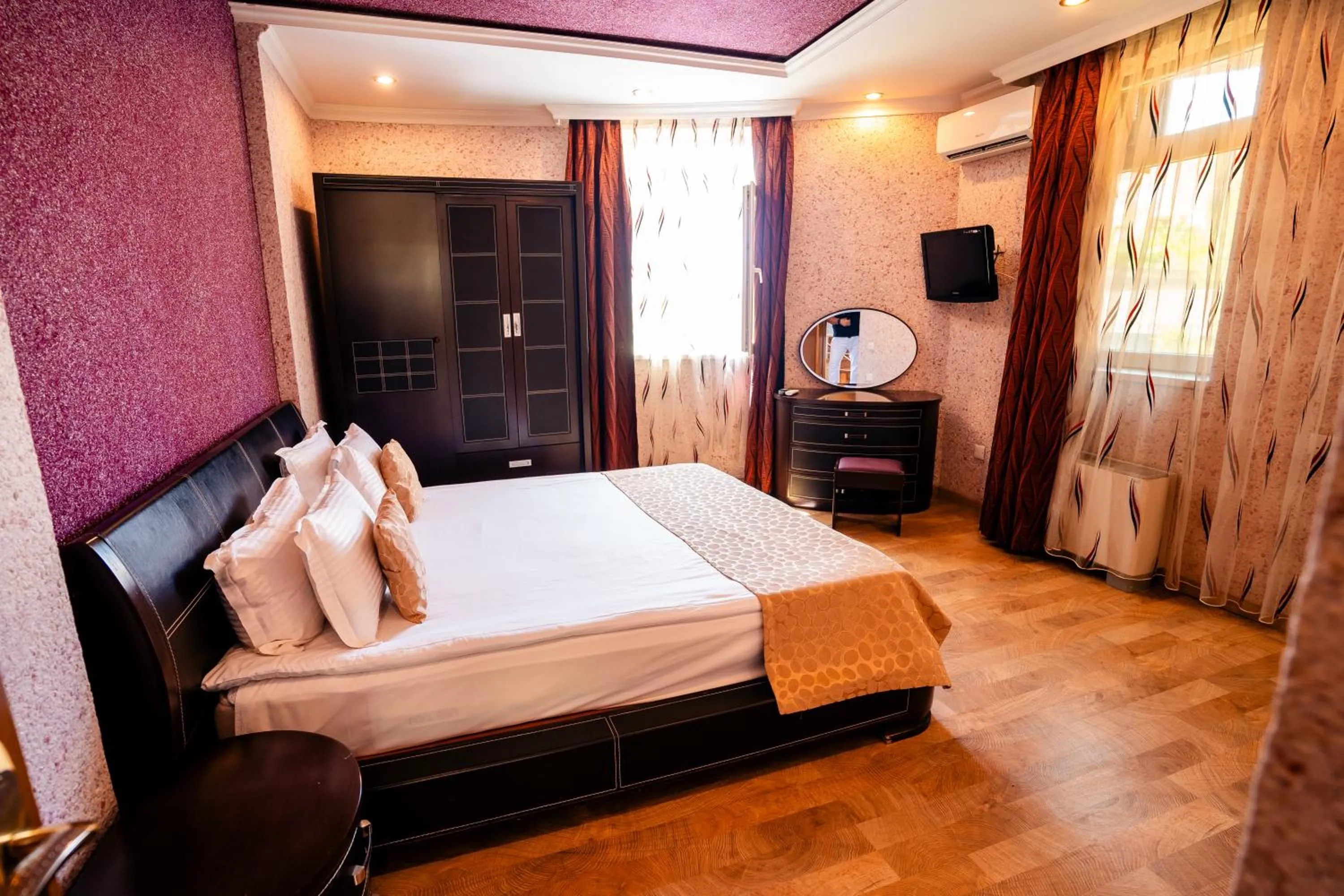 Bed in Panorama Villa Lux Hotel