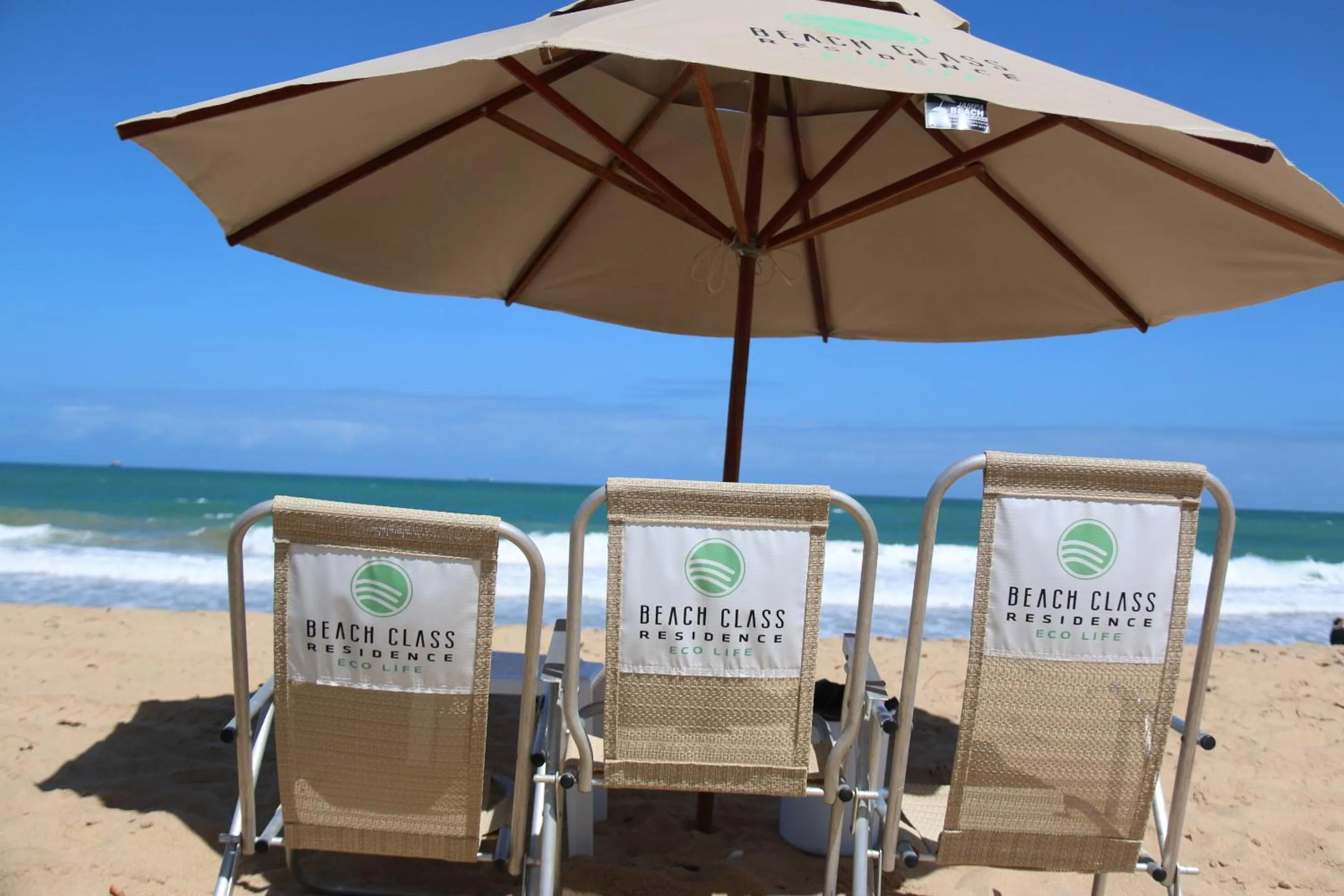 Property logo or sign in Beach Class Eco LIfe - BL 08-202 - Apartamento Inteiro