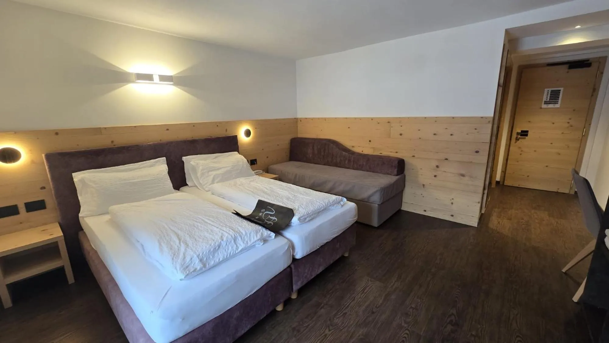 Bed in Alpen Hotel Vidi