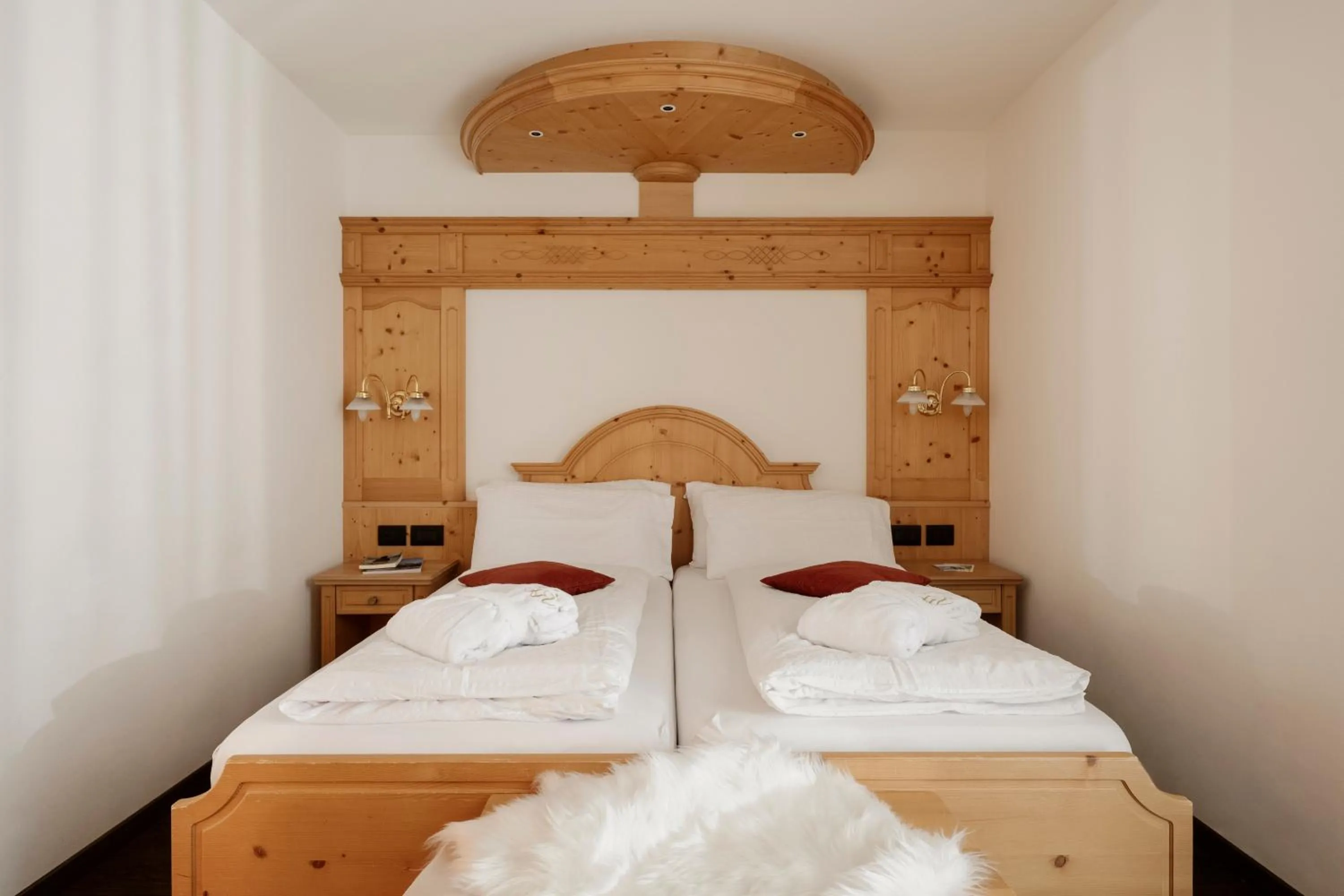 Bed in Alpen Hotel Vidi