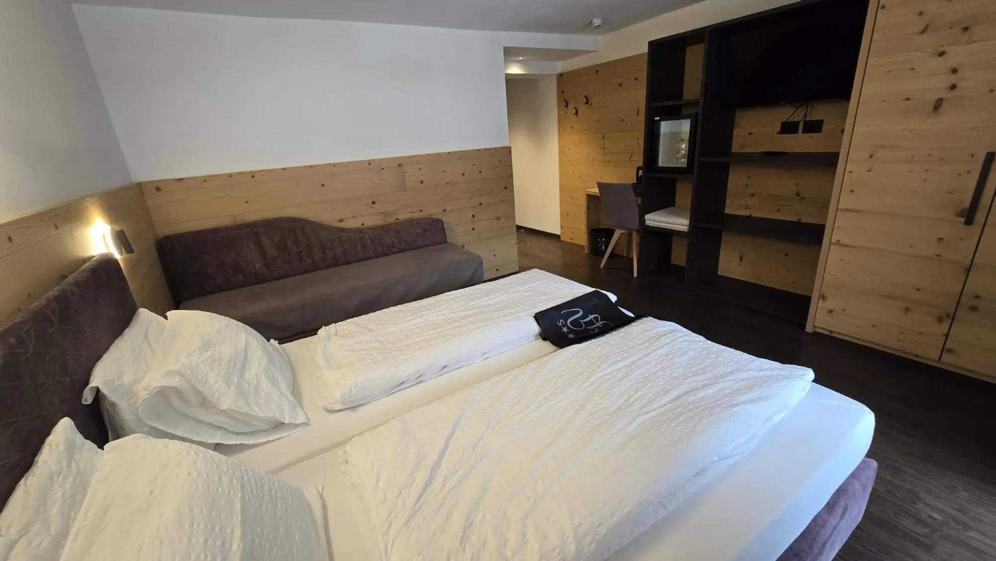 Bed in Alpen Hotel Vidi