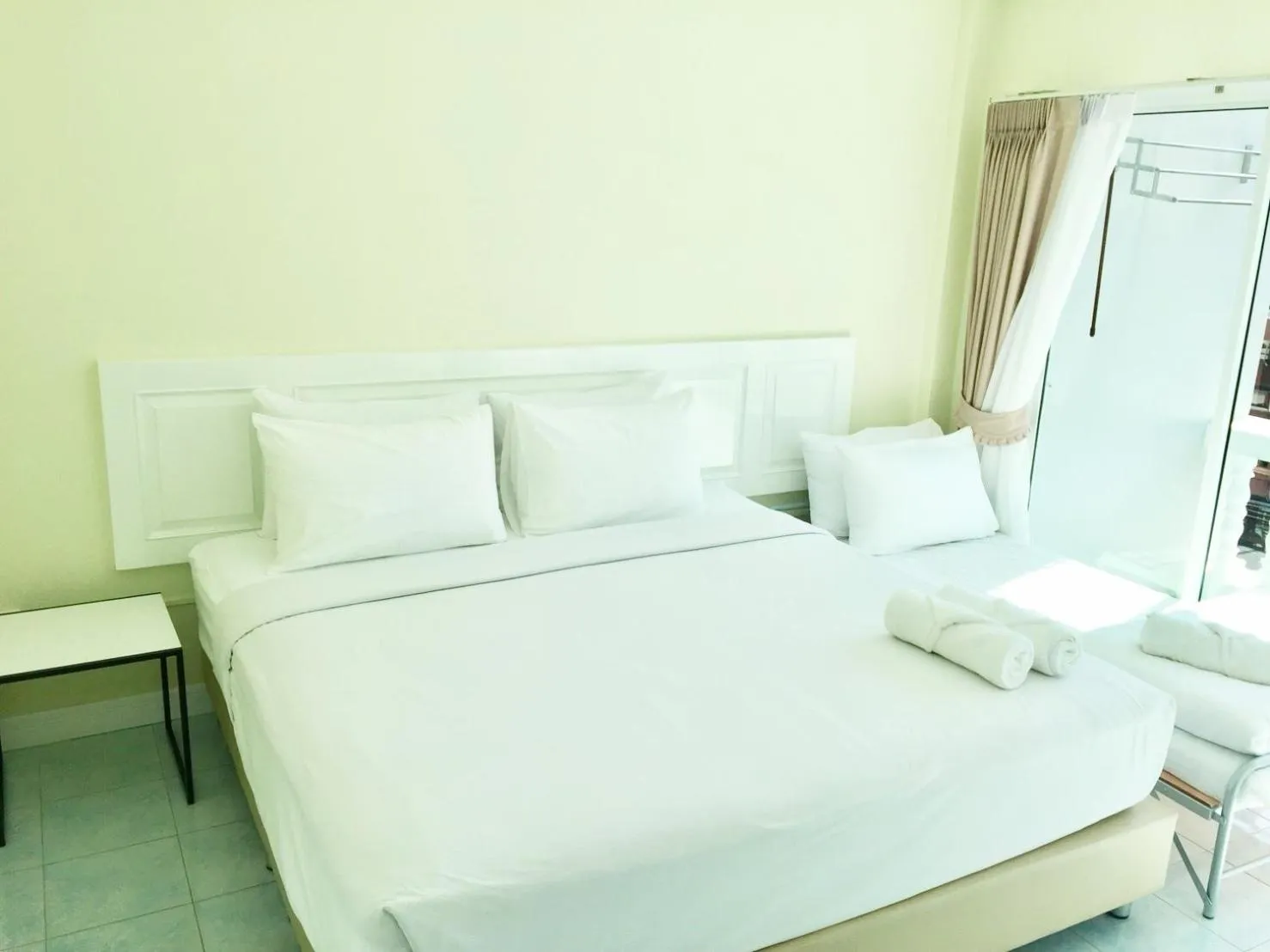 Bed in Thai Orchid Guest House