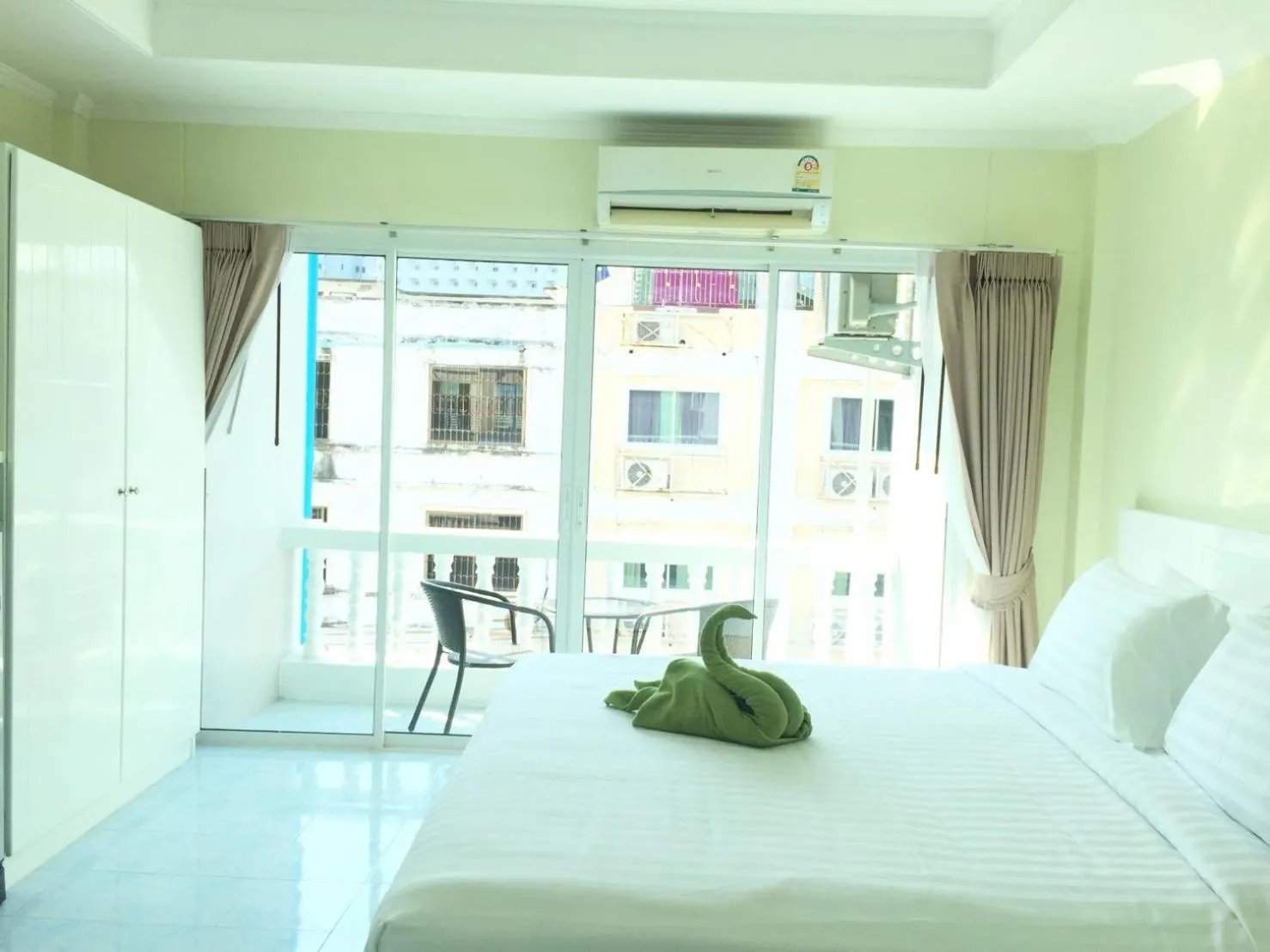 Bed in Thai Orchid Guest House