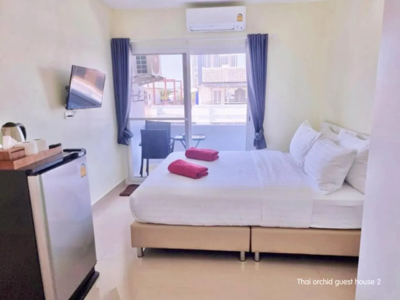 Bed in Thai Orchid Guest House