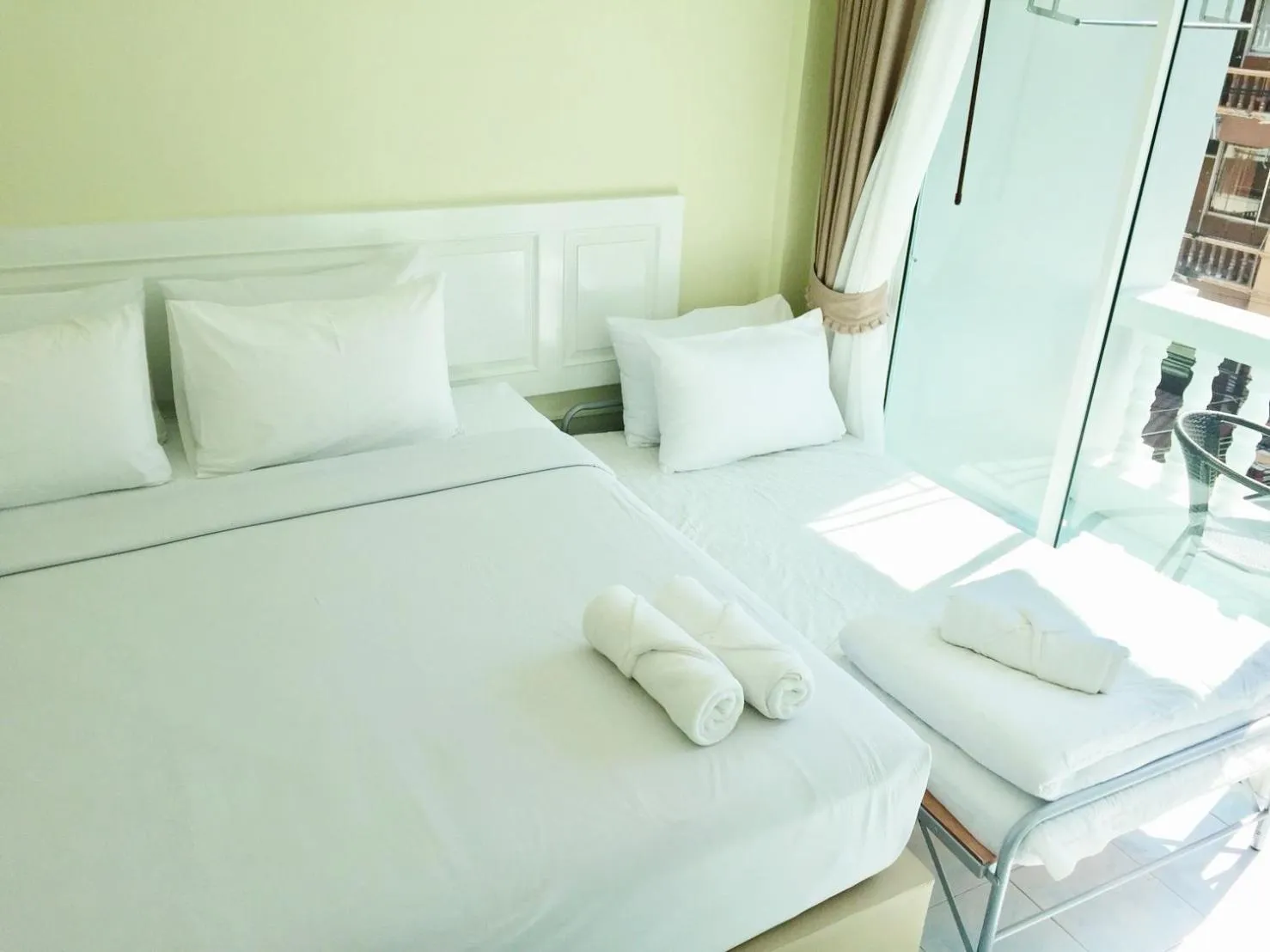 Bed in Thai Orchid Guest House