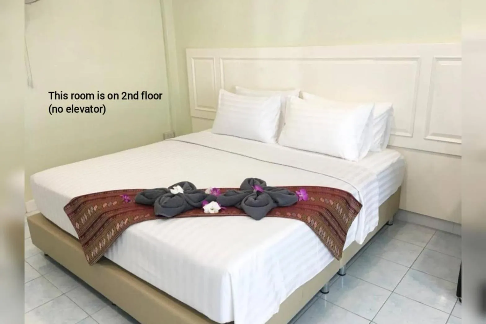 Bed in Thai Orchid Guest House
