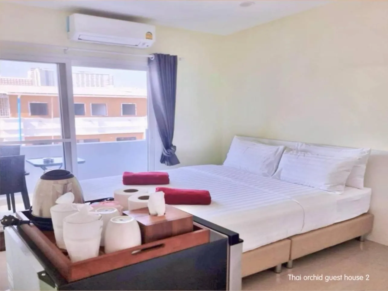 Bed in Thai Orchid Guest House