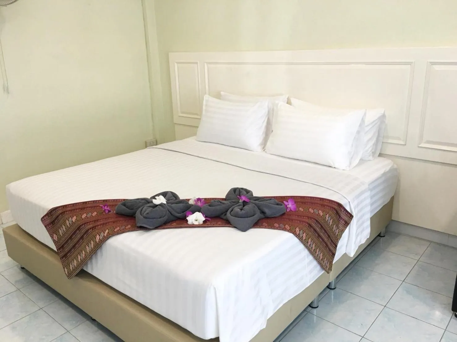 Bed in Thai Orchid Guest House