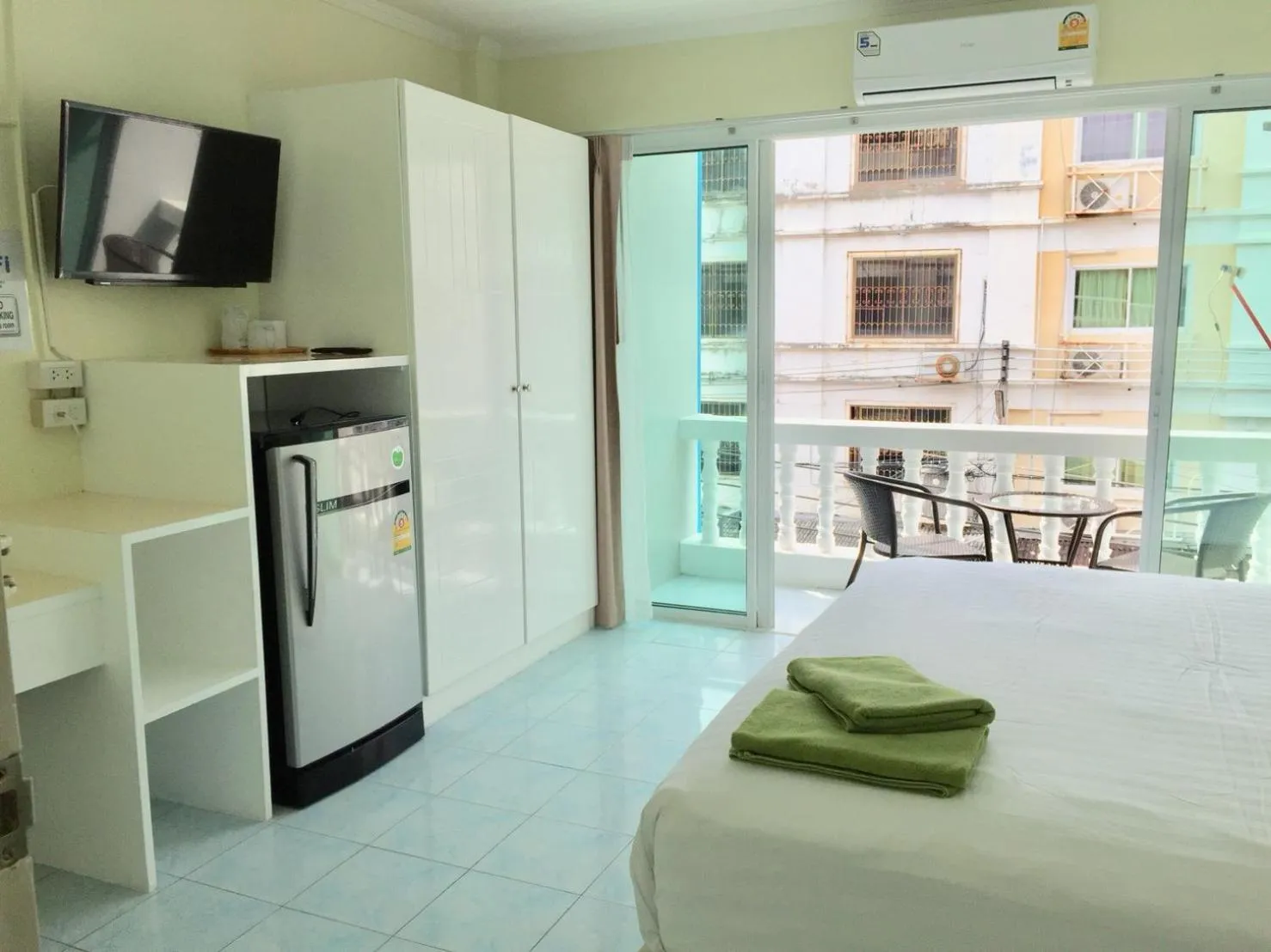 Bed in Thai Orchid Guest House