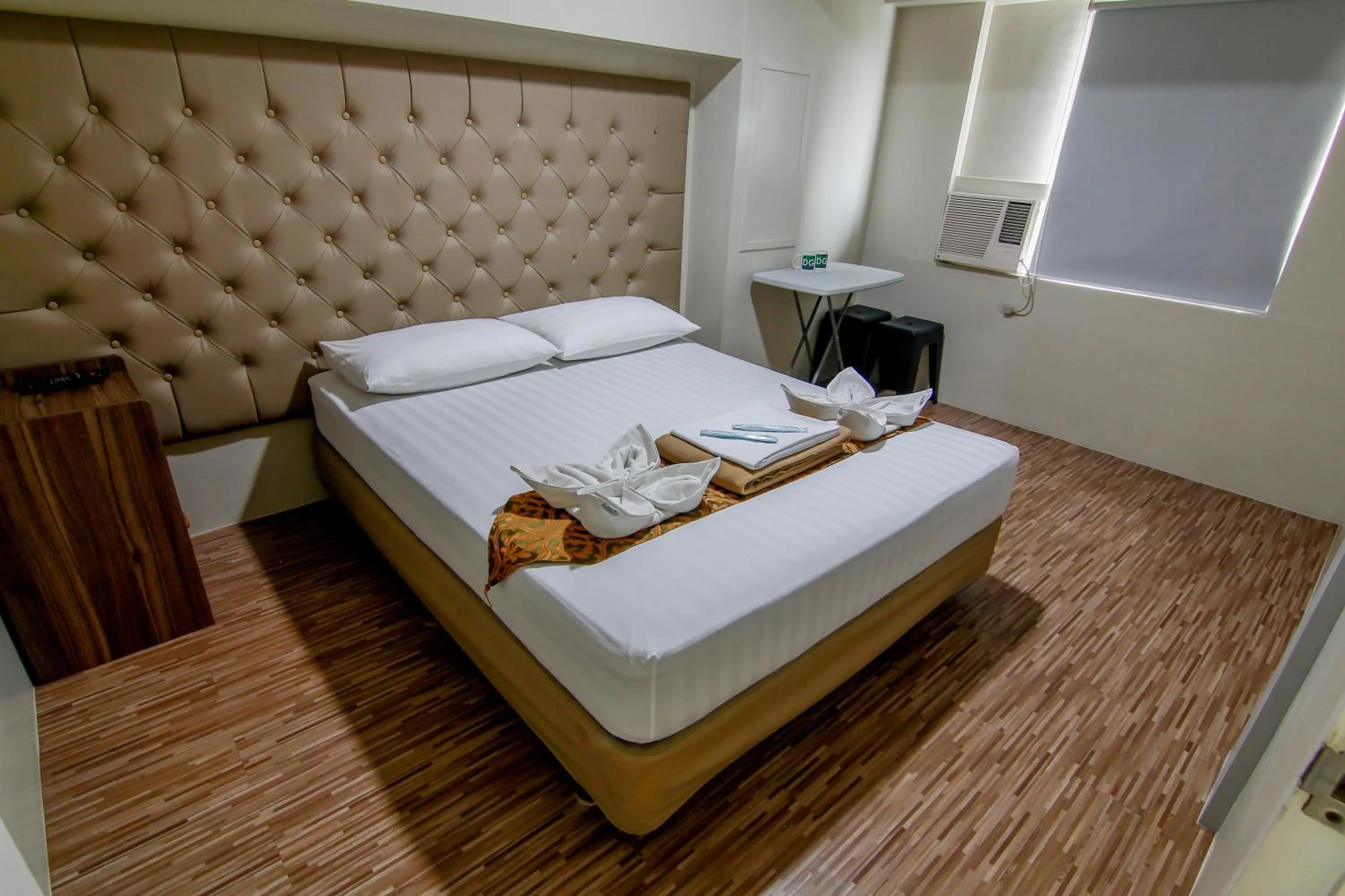 Bed in DG Budget Hotel Salem