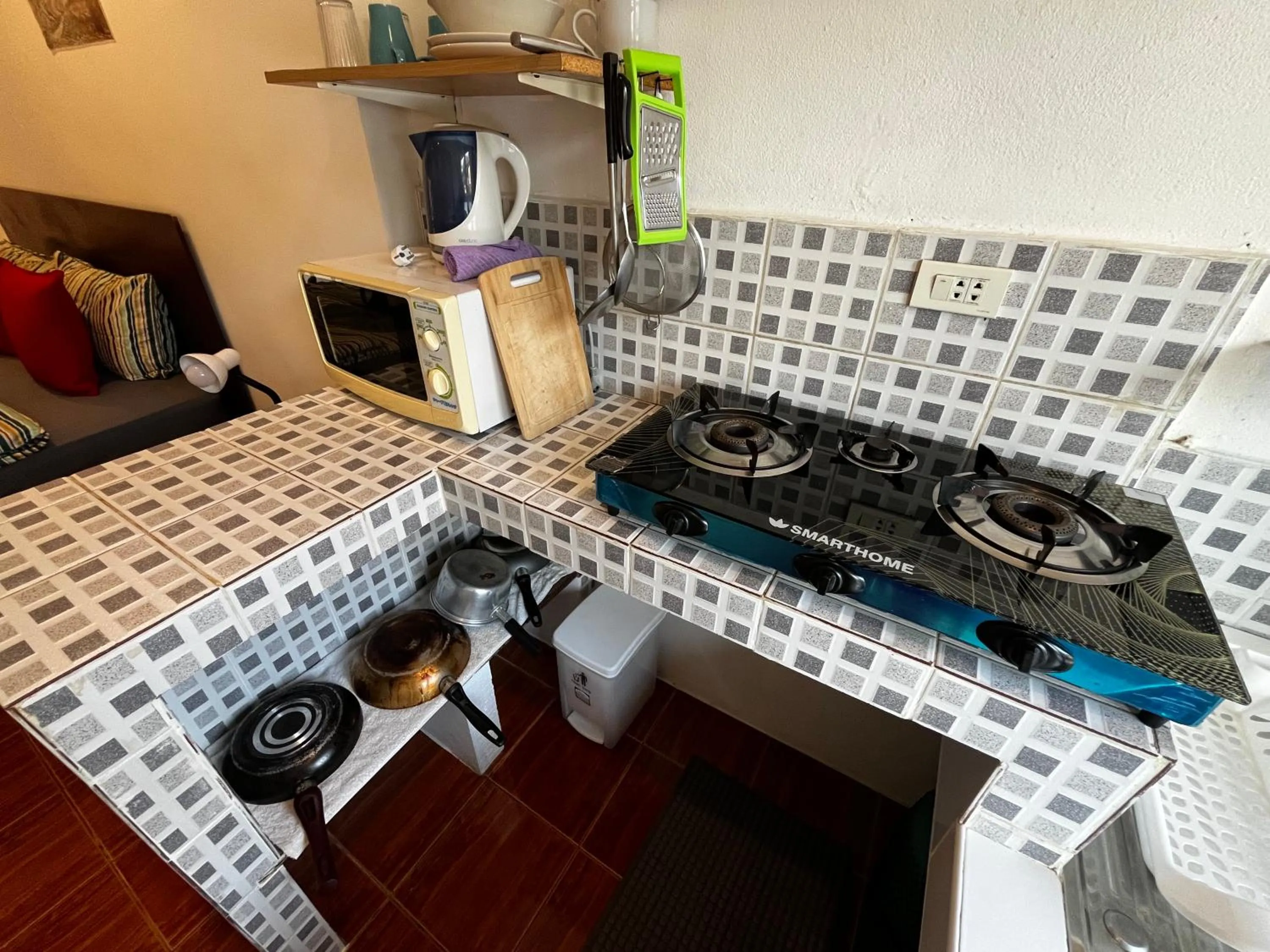 Kitchen or kitchenette in Amy Village Apartments & Digital Hub