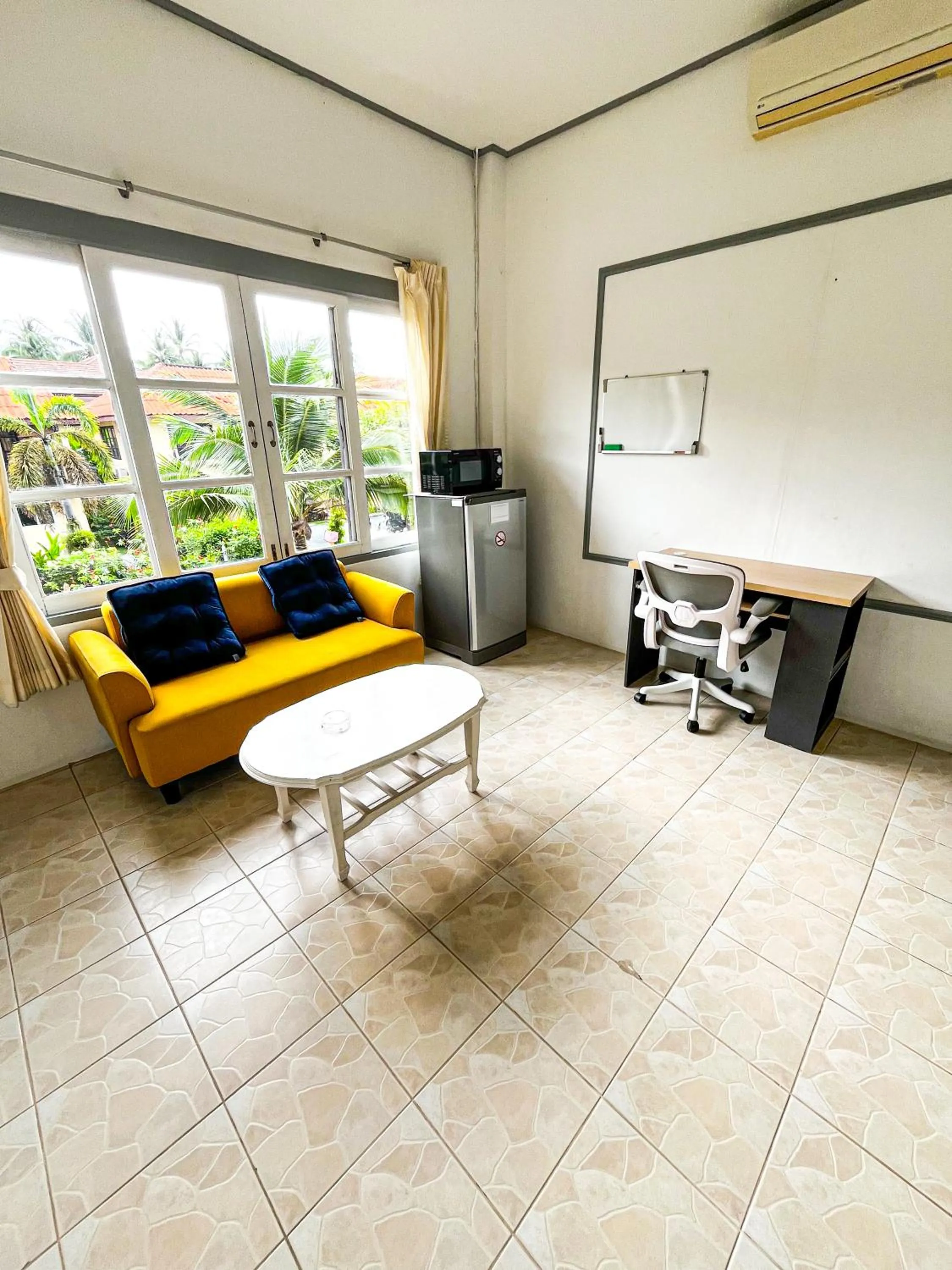 Living room in Amy Village Apartments & Digital Hub