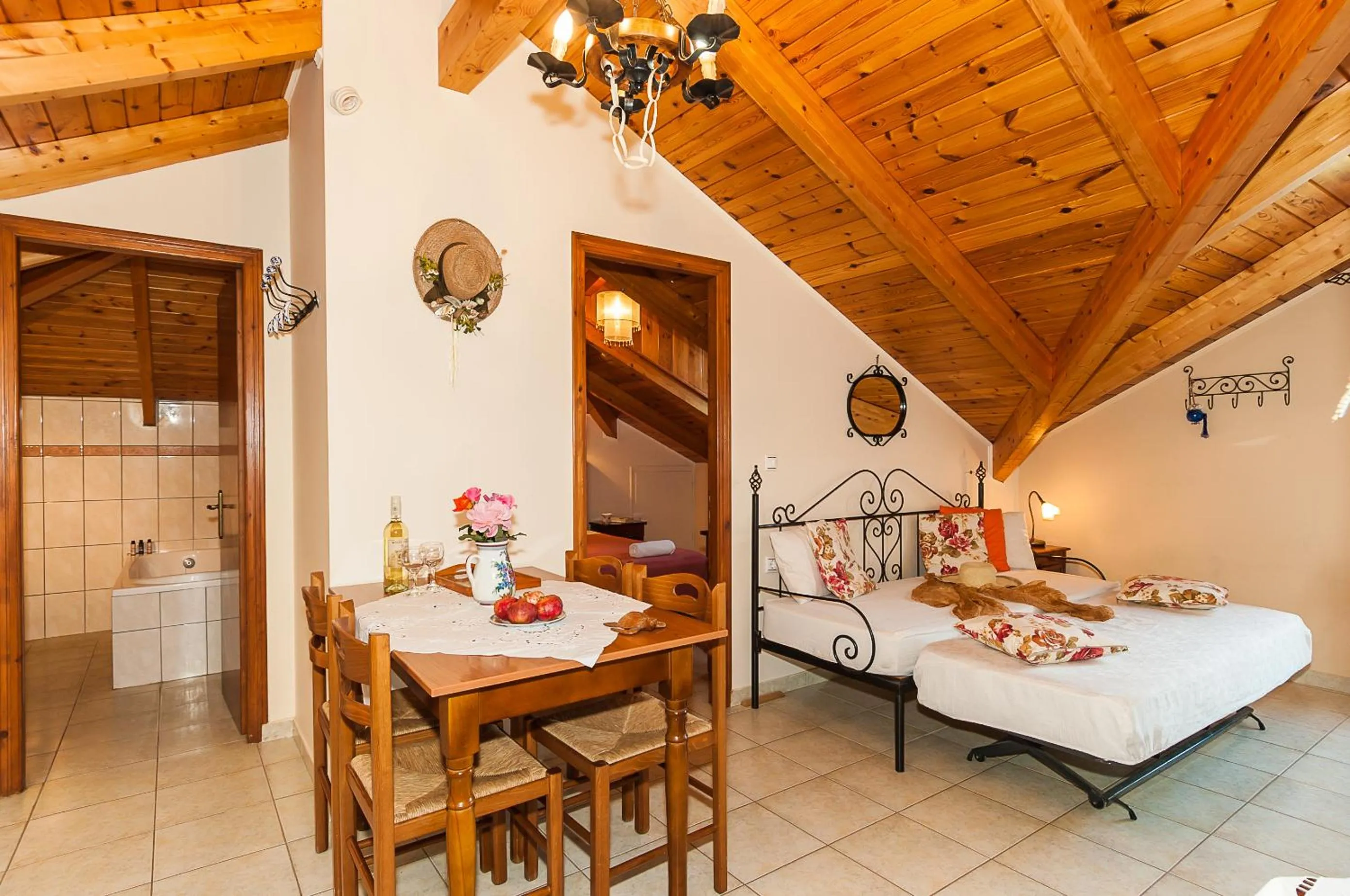 Living room, Bed in Kavos Psarou Studios & Apartments