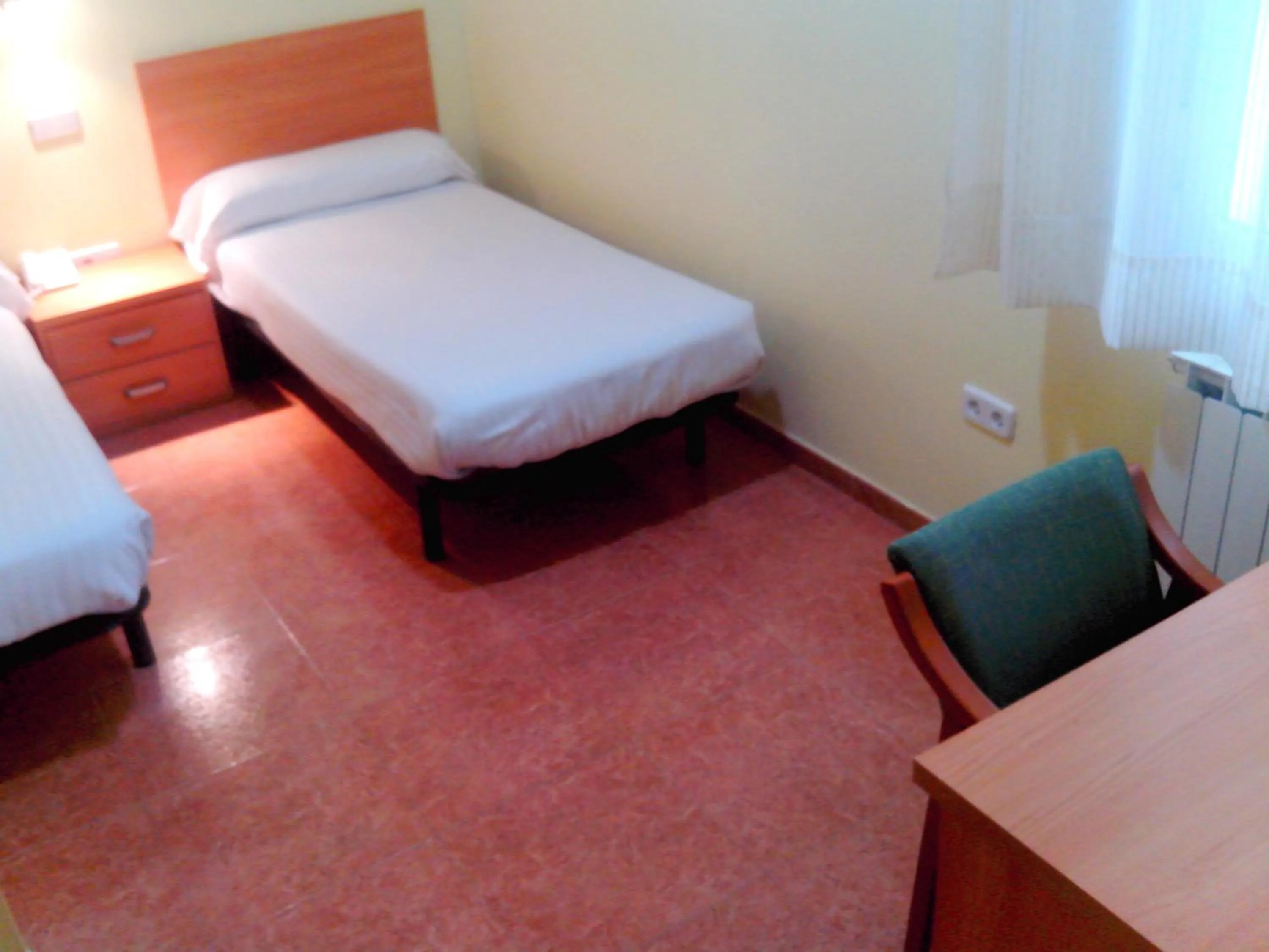 Photo of the whole room, Bed in Hotel RC Ramon y Cajal