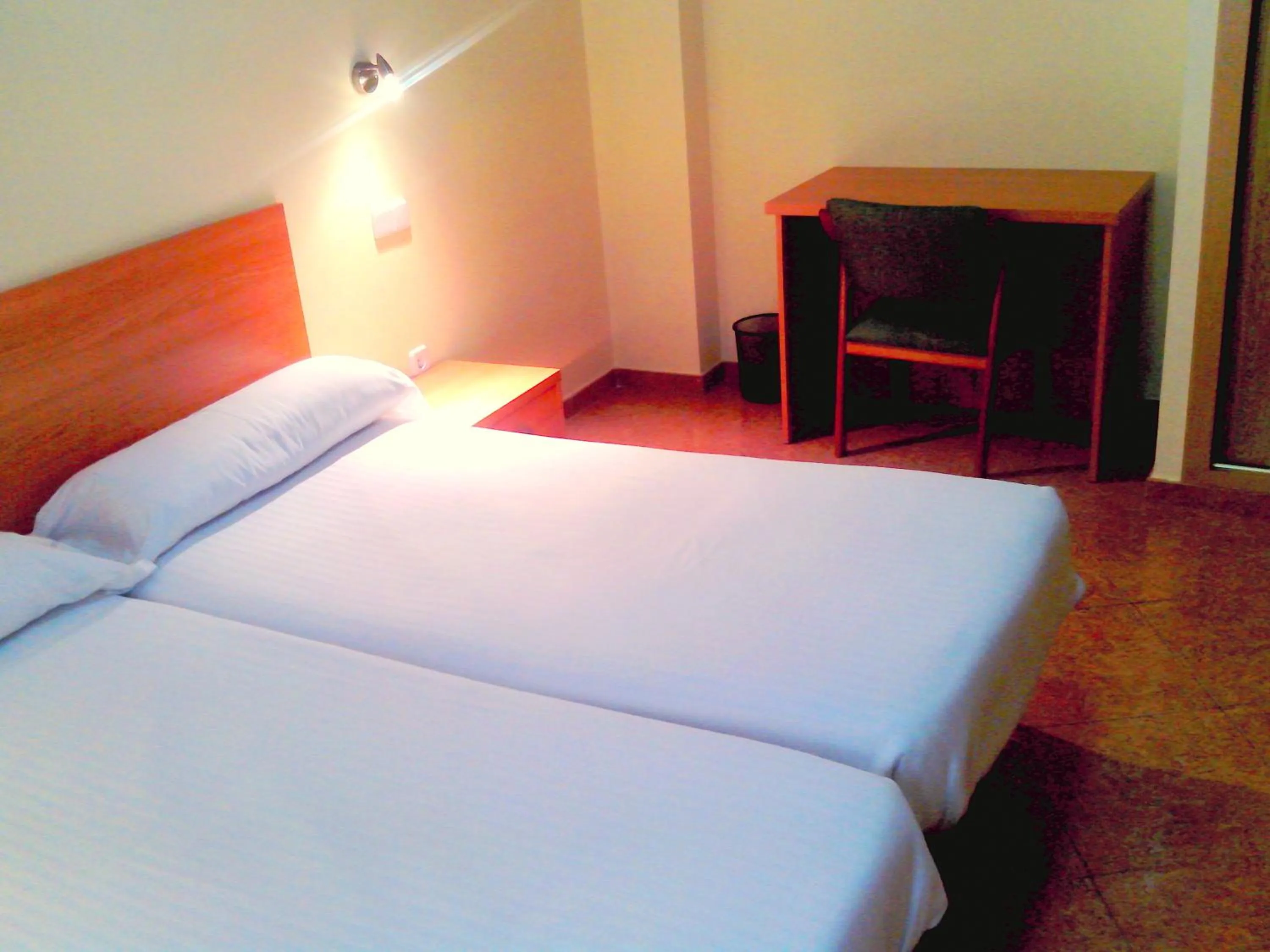 Bed in Hotel RC Ramon y Cajal
