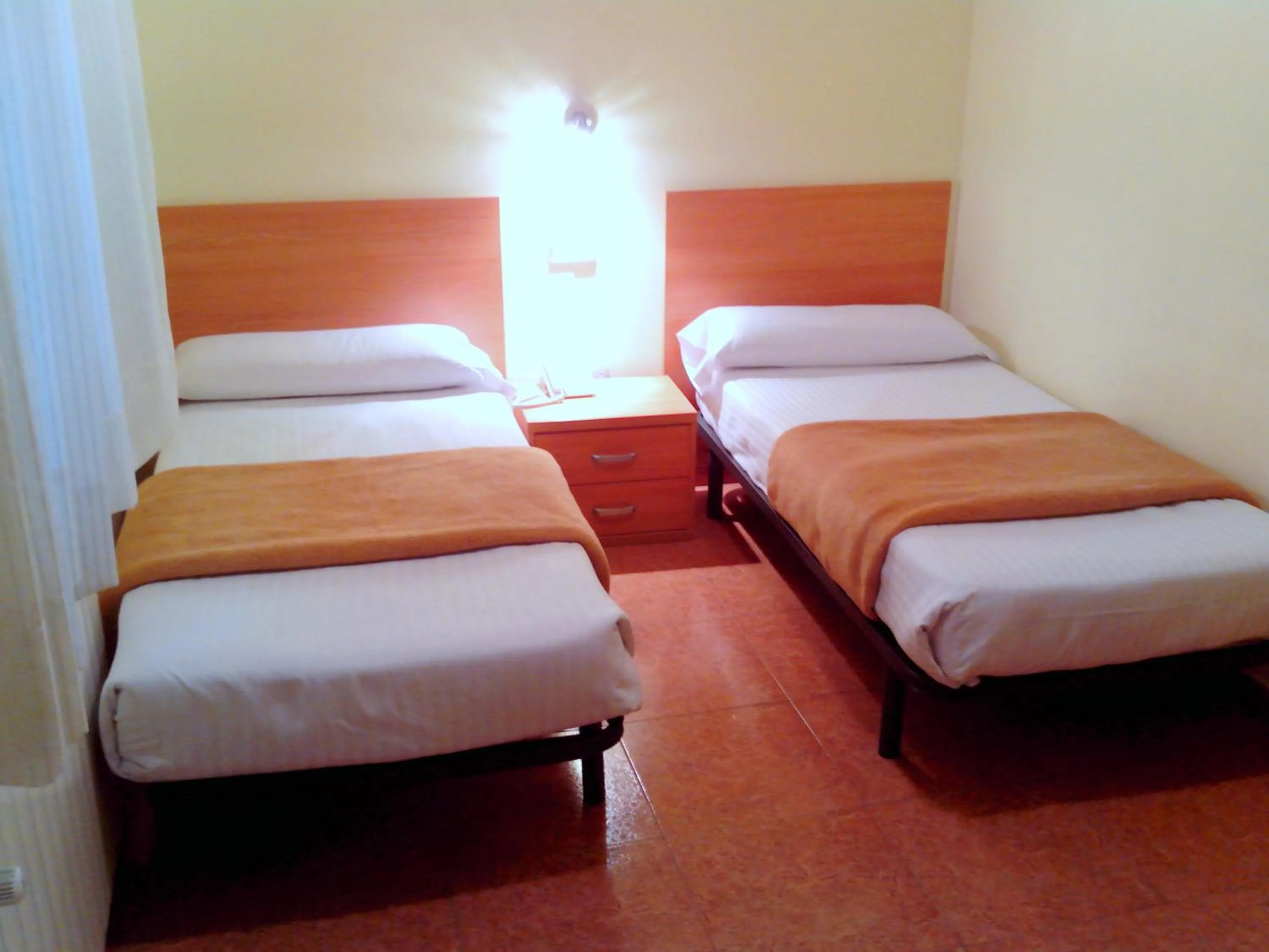 Bed in Hotel RC Ramon y Cajal