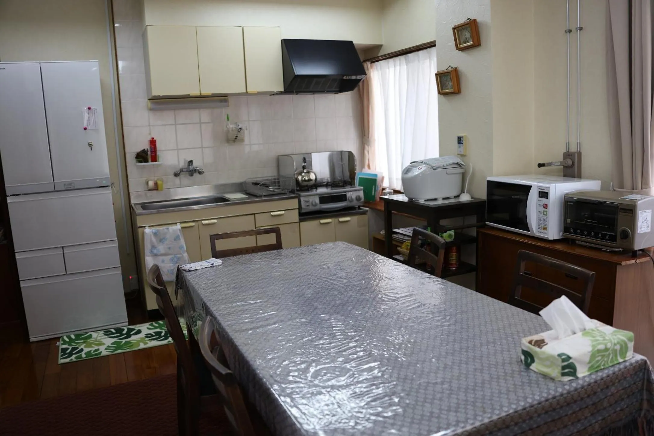 Kitchen or kitchenette in Pension Umi no soba