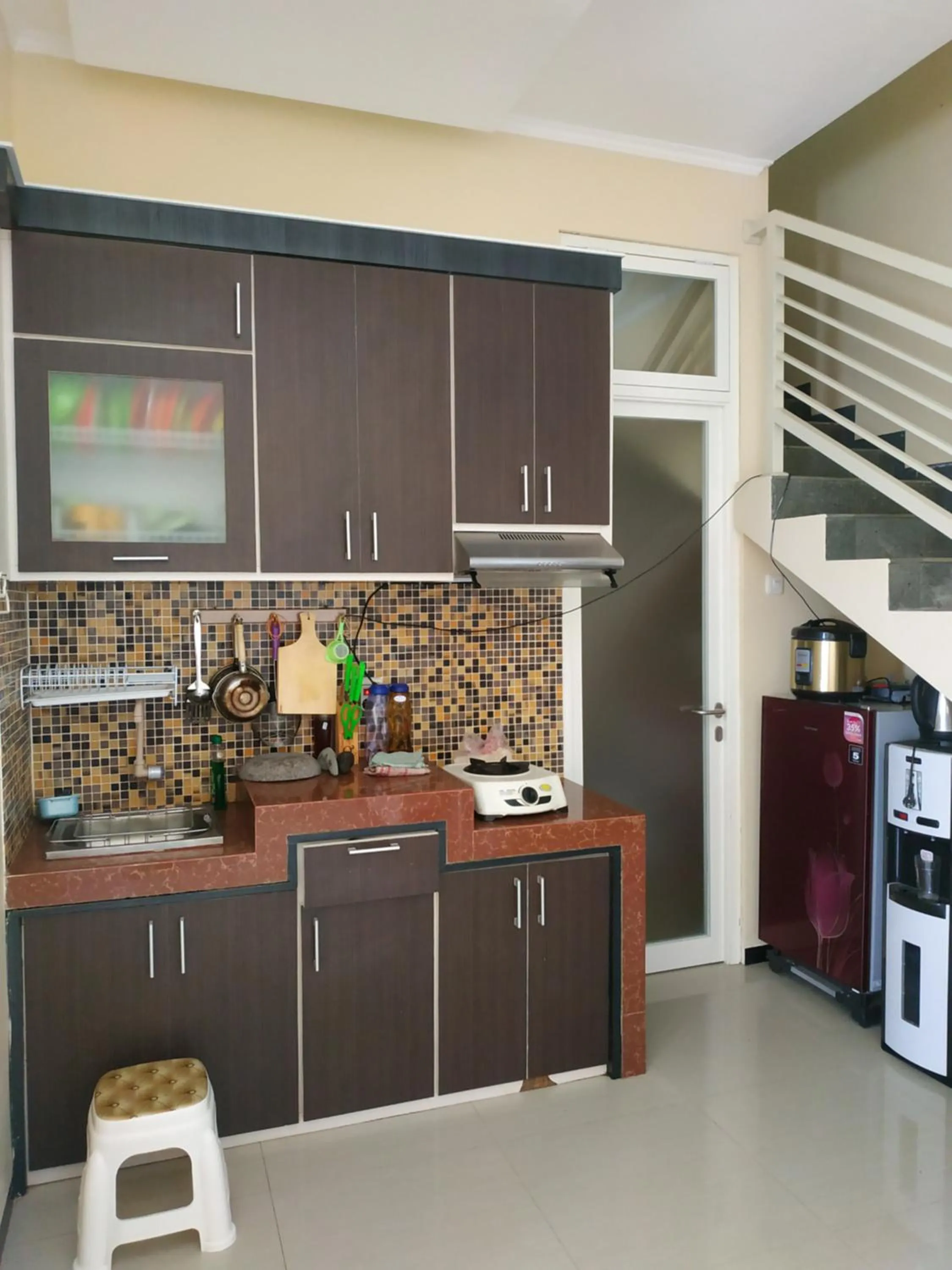 Kitchen or kitchenette in Villa Gumilang