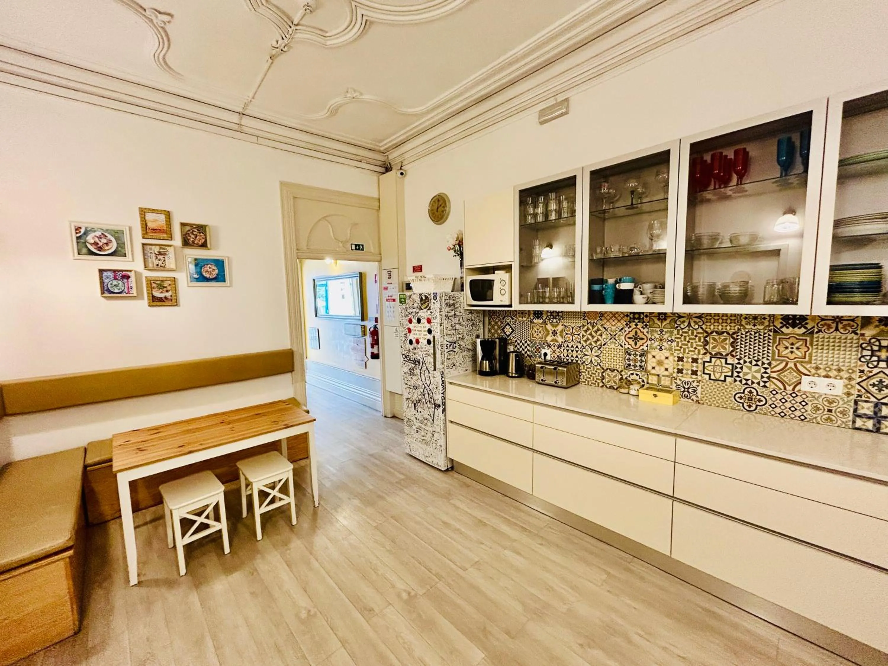 Communal kitchen in Porto Wine Hostel