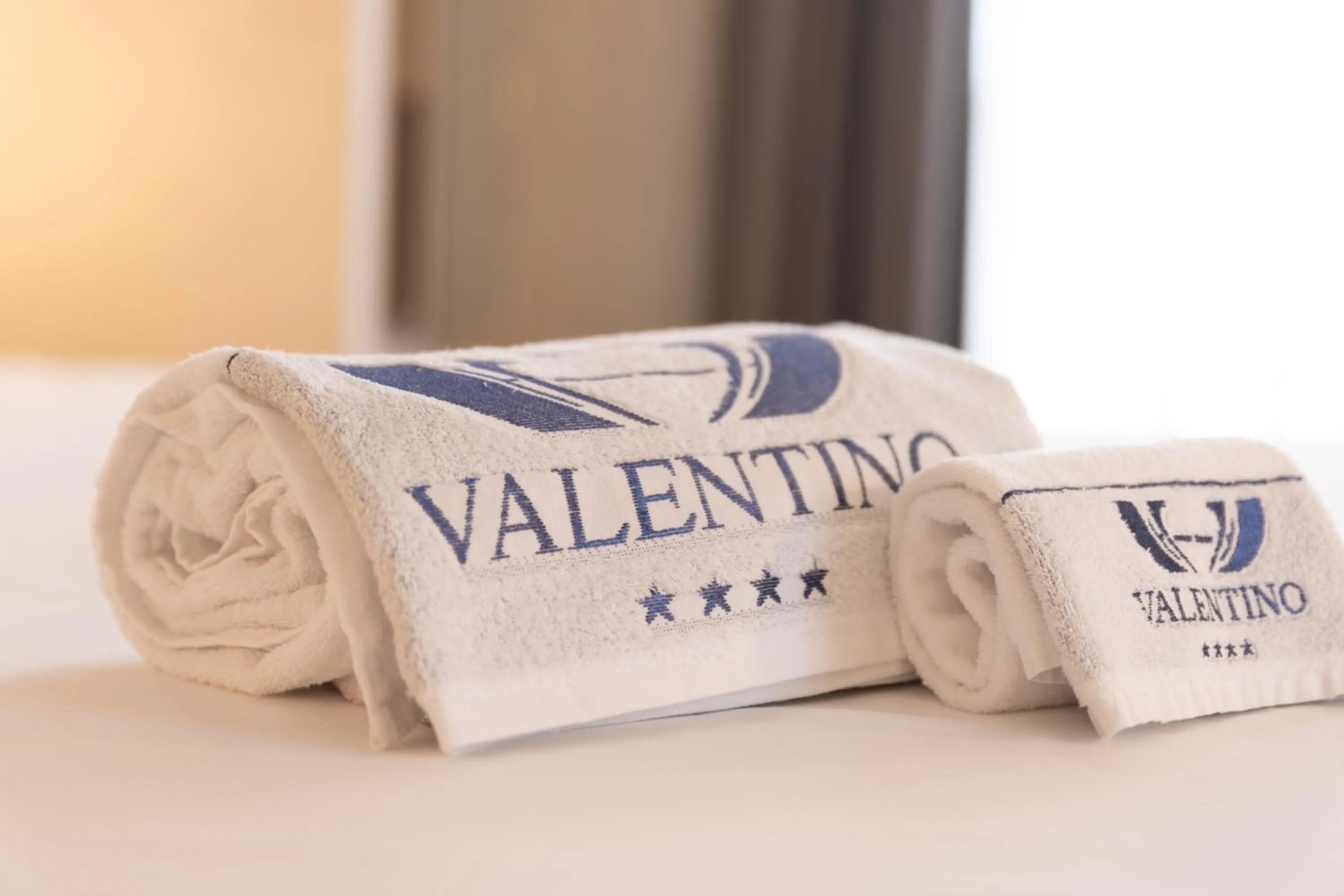 Property logo or sign, Bed in Hotel Valentino