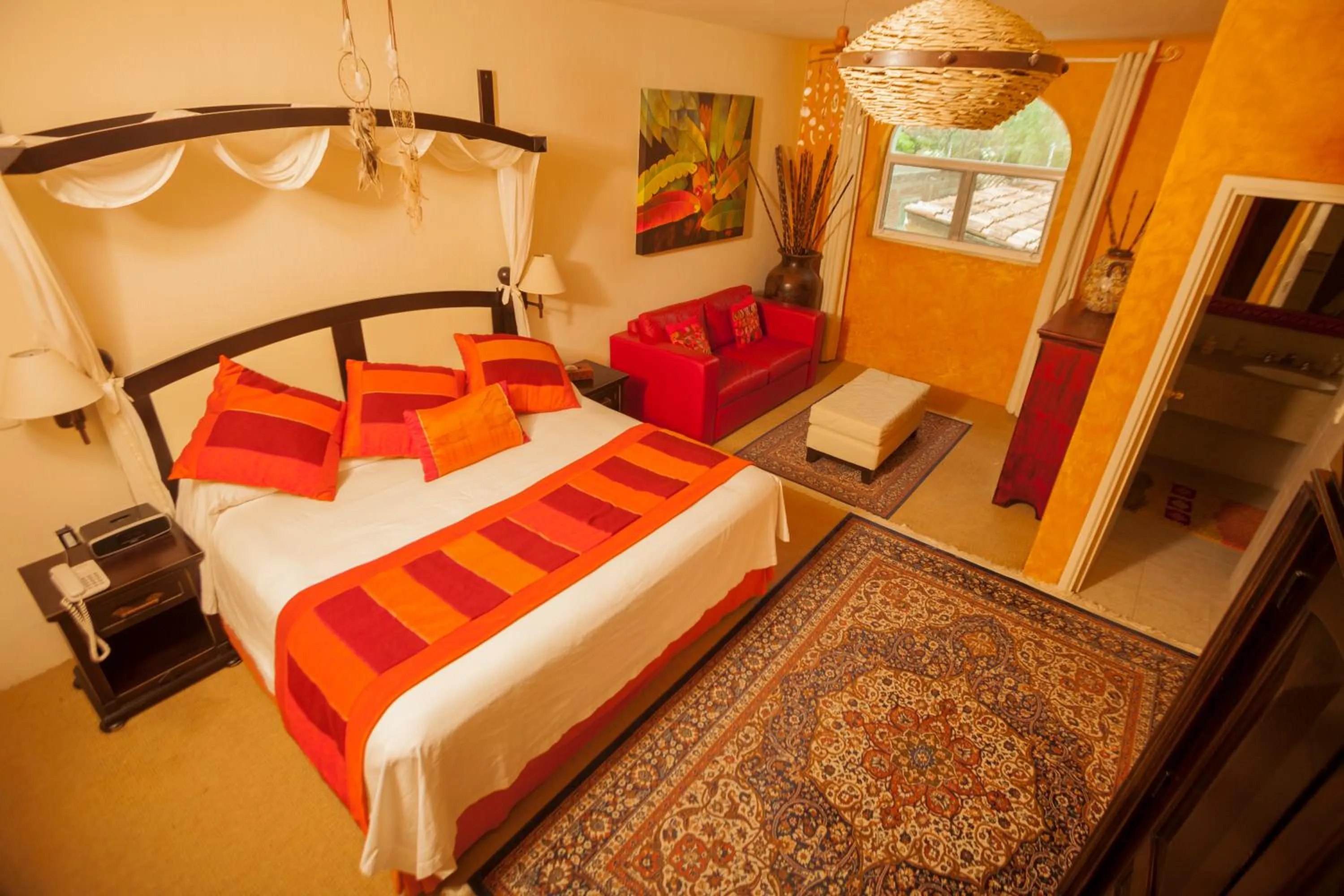 Bed in El Chante Spa Hotel