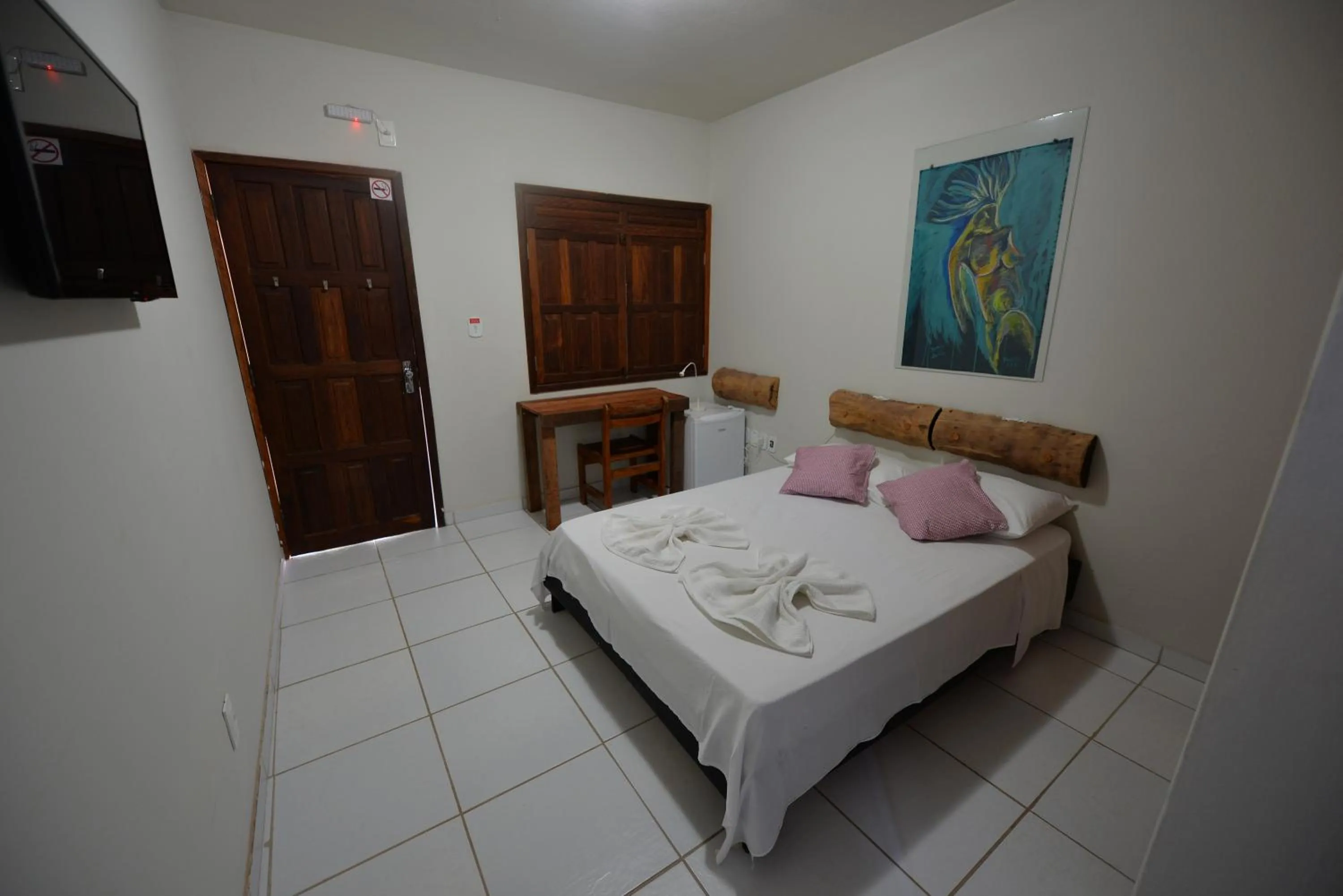 Bed in Pousada do Gunga