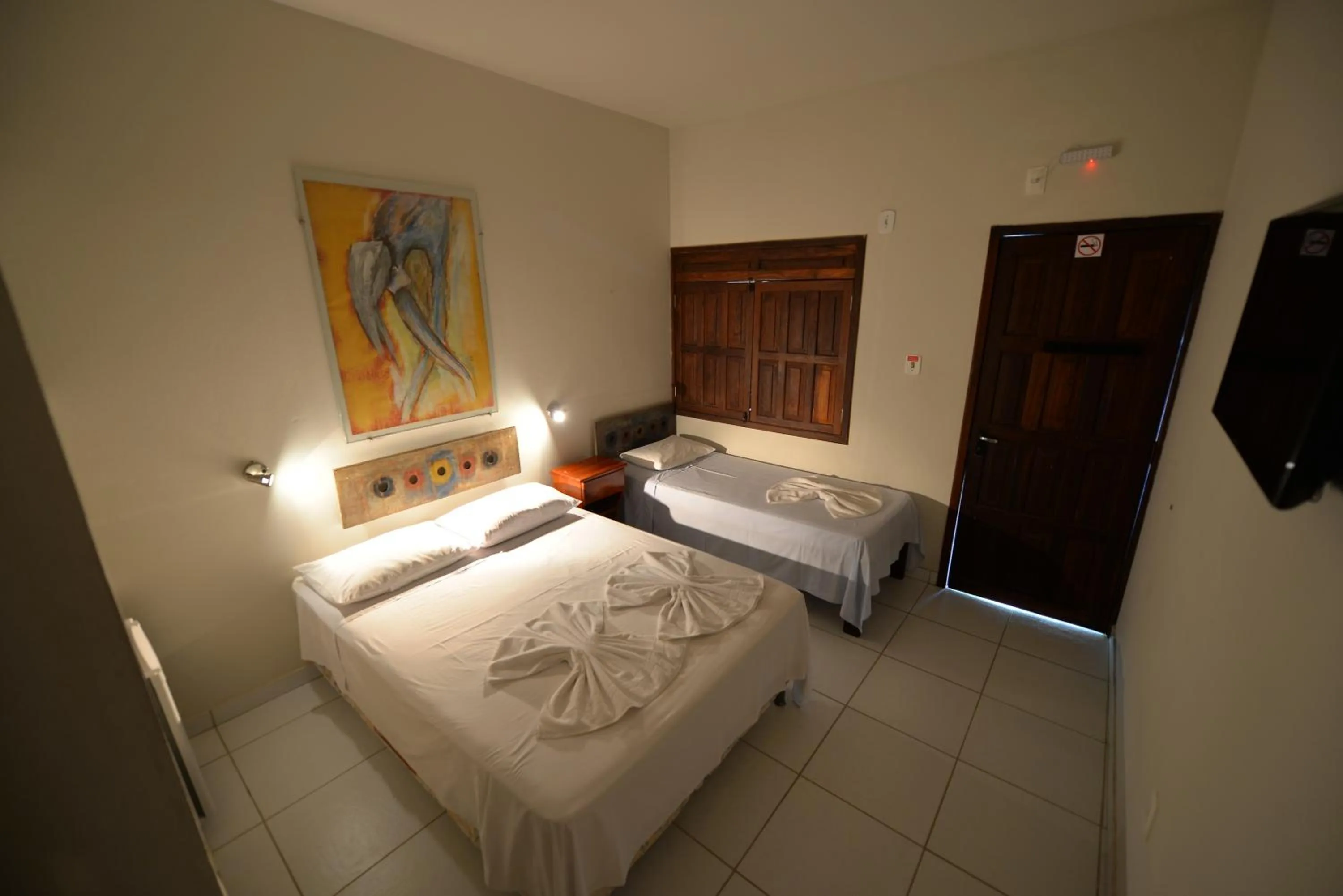 Bed in Pousada do Gunga