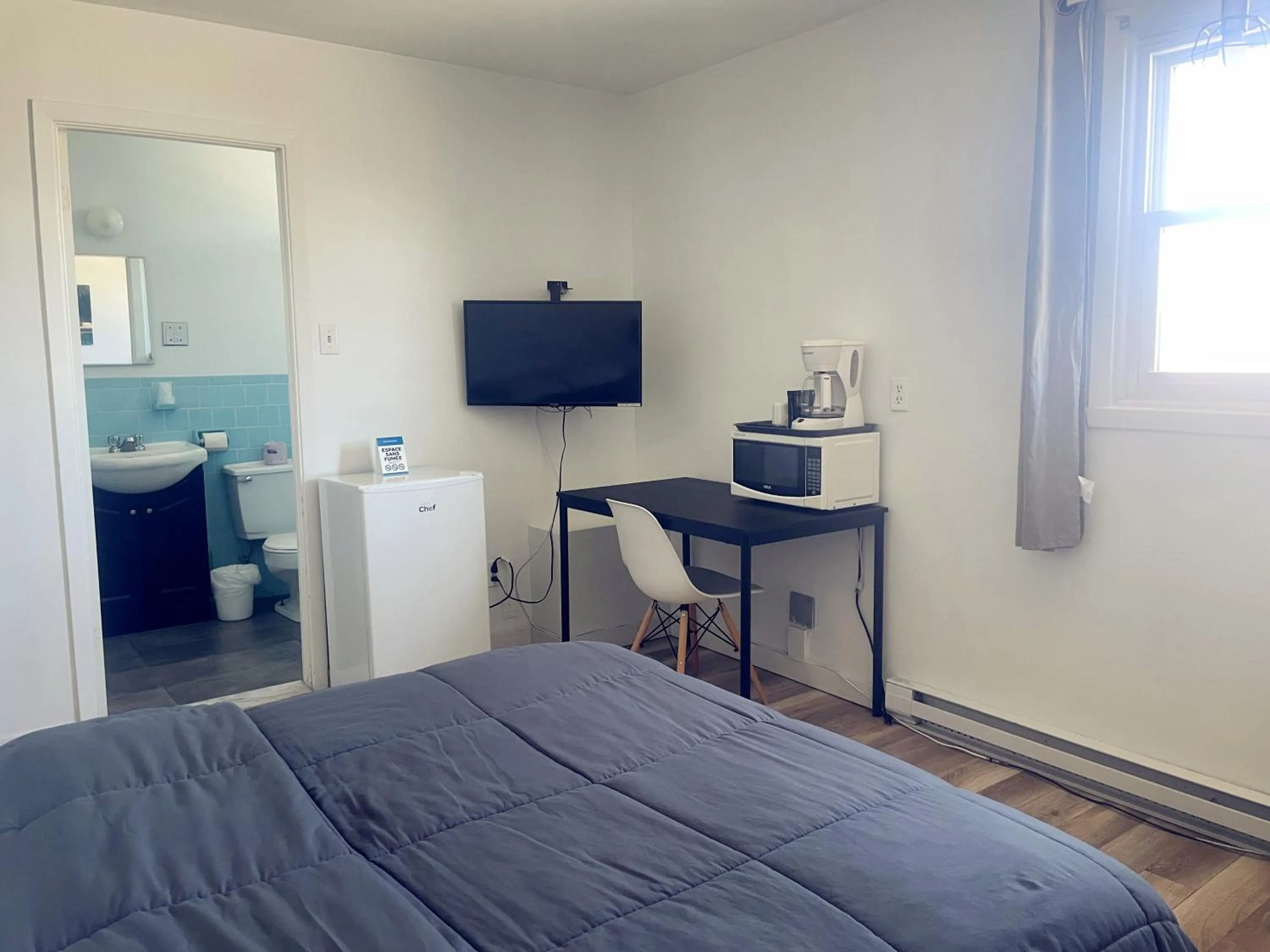 Bed in Motel Grande Ile