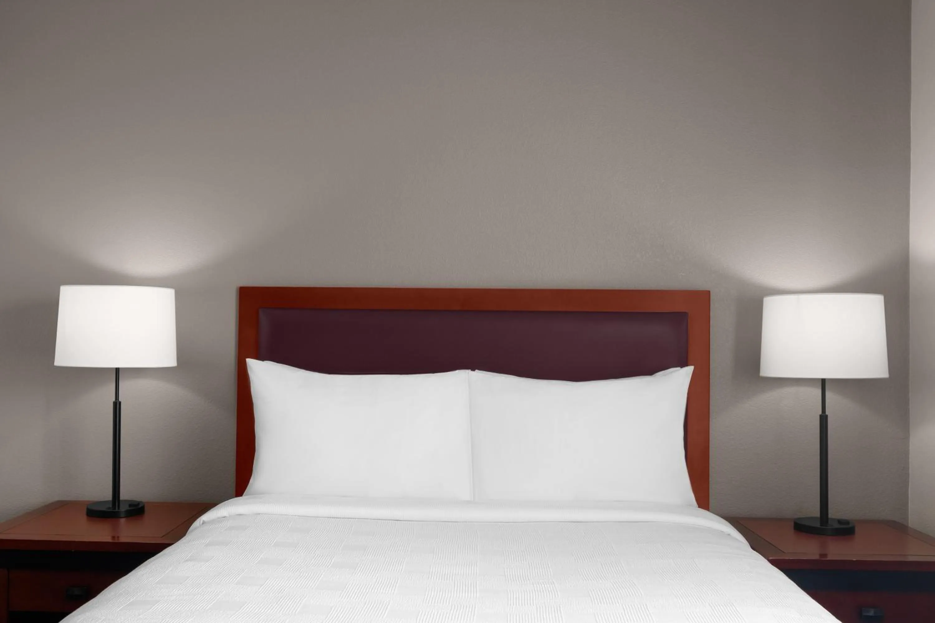 Bed in Larkspur Landing Extended Stay Suites Sunnyvale