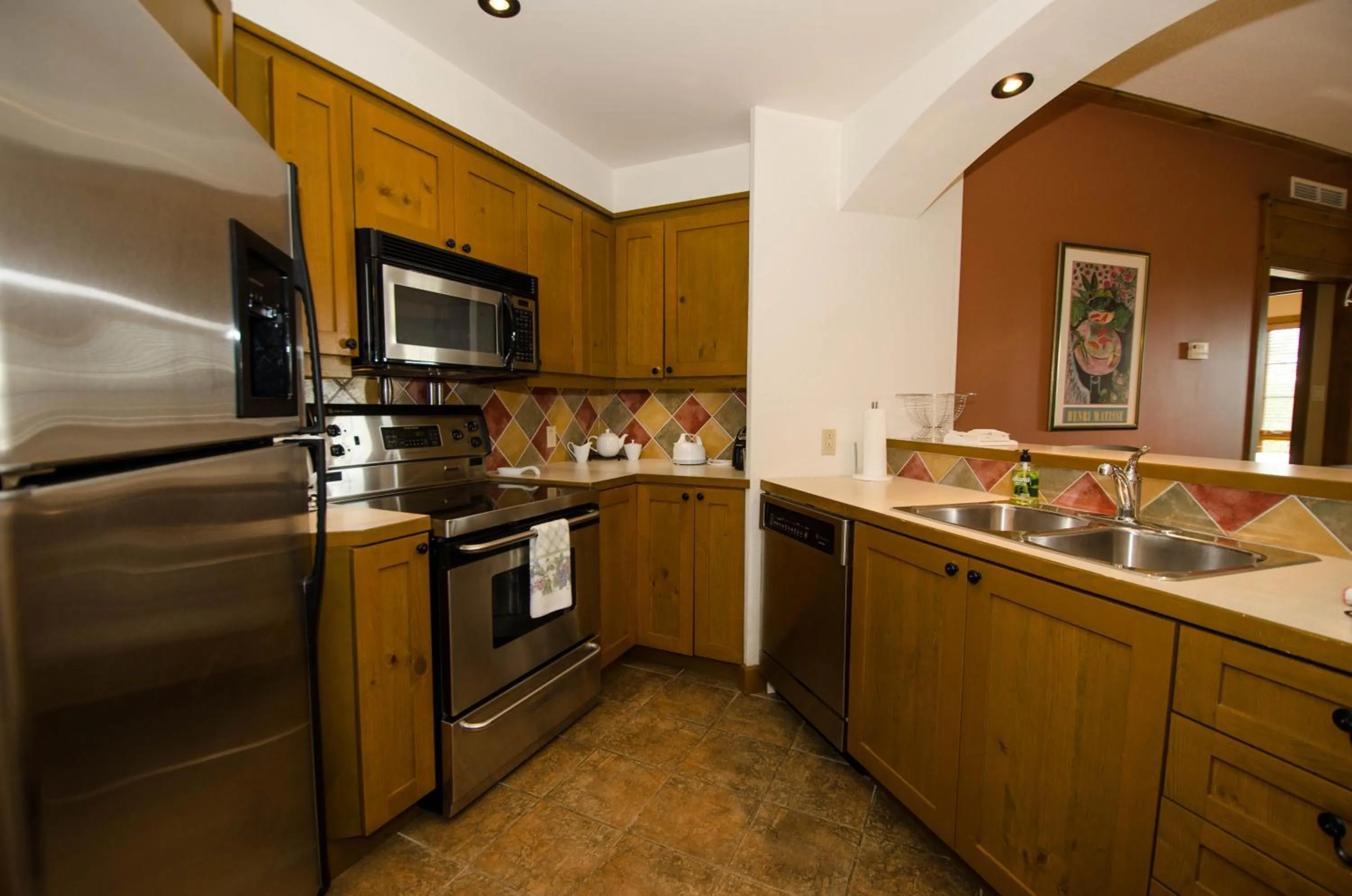 Kitchen or kitchenette in Luxurious Equinoxe Ski-in/Ski-out