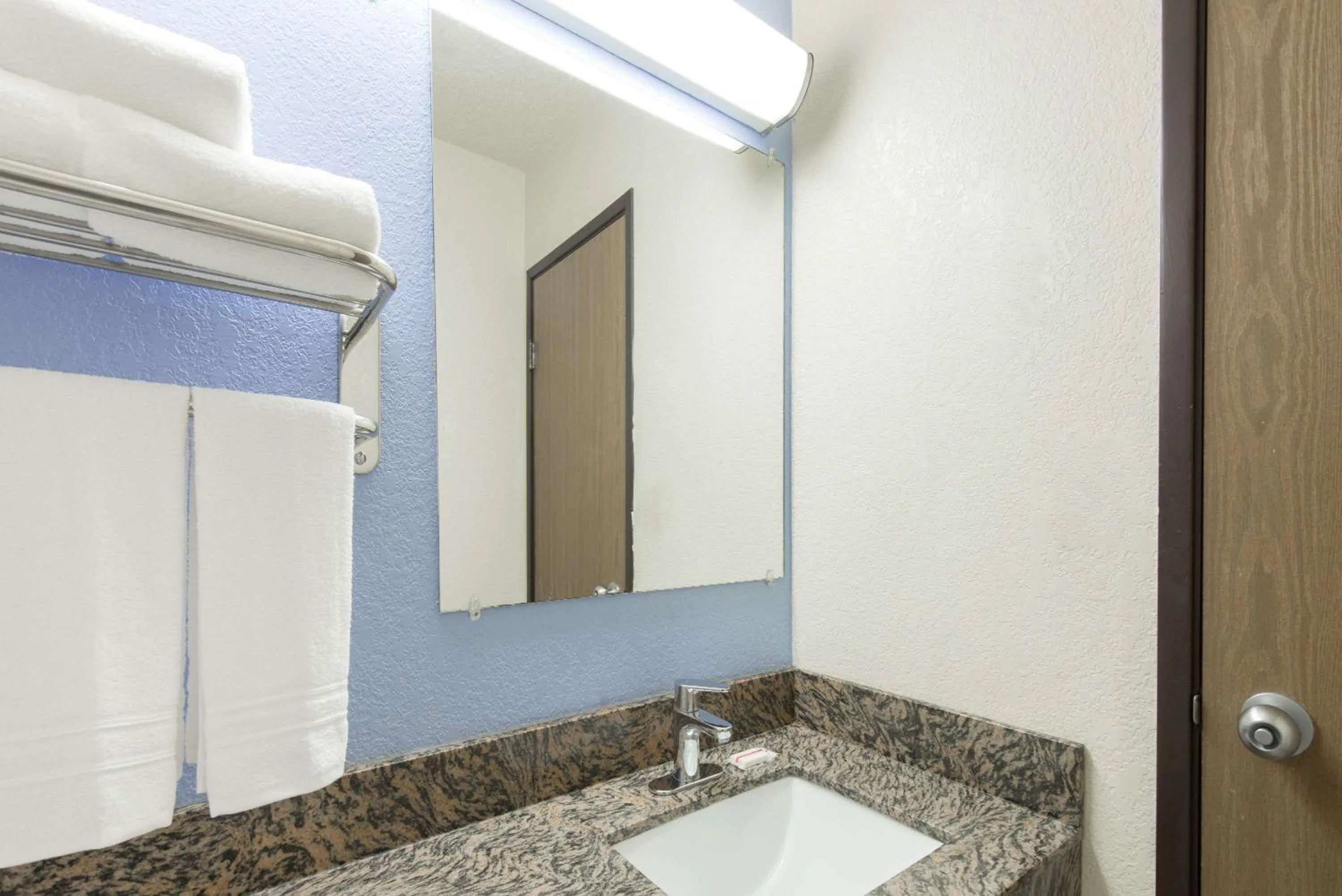 Bathroom in Super 8 by Wyndham New Castle