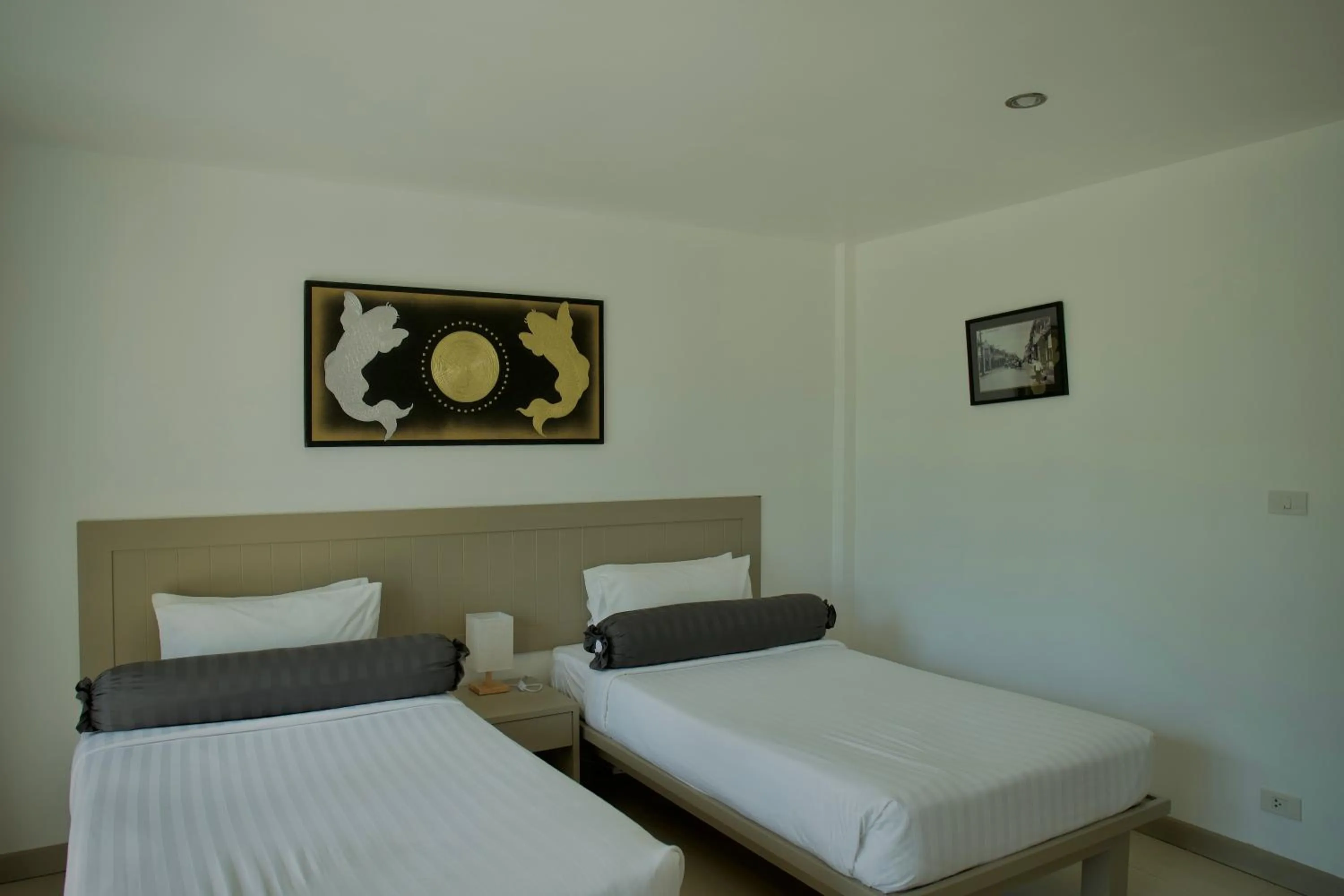 Bed in Ampha Place Hotel