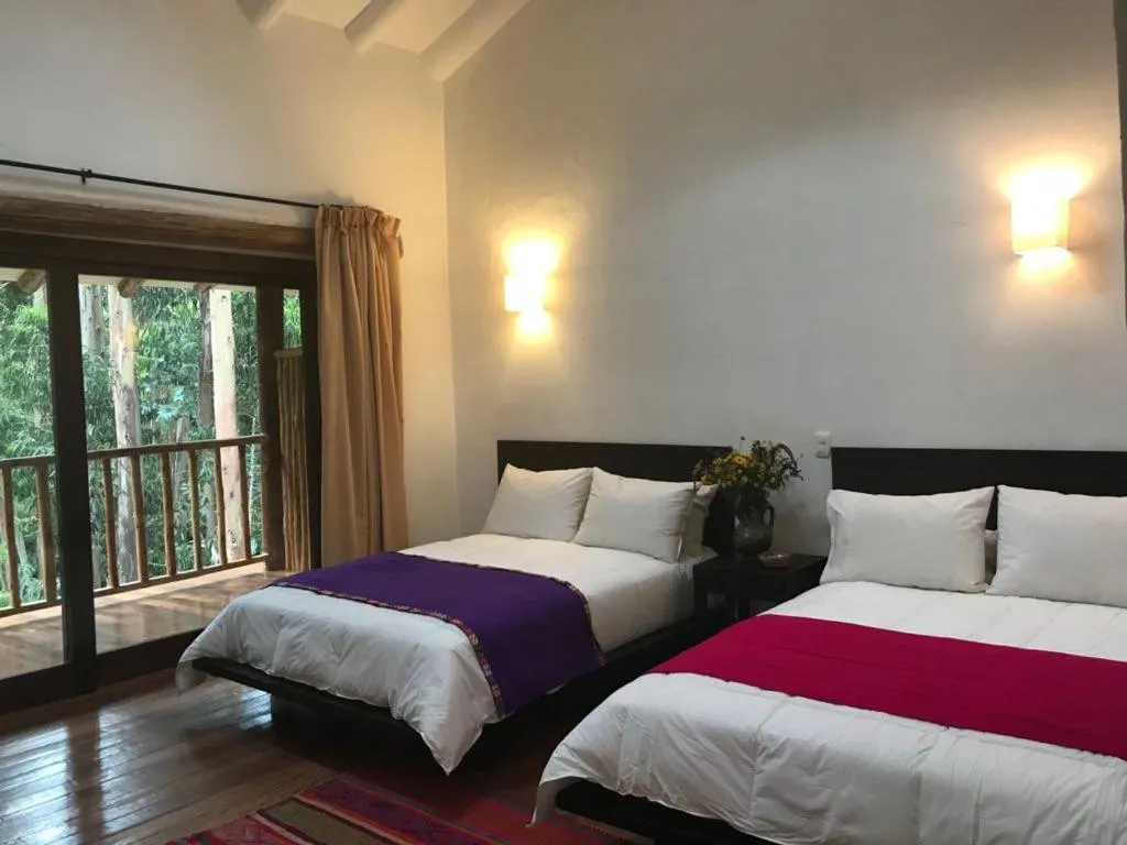 Photo of the whole room, Bed in Bamboo Lodge Sacred Valley