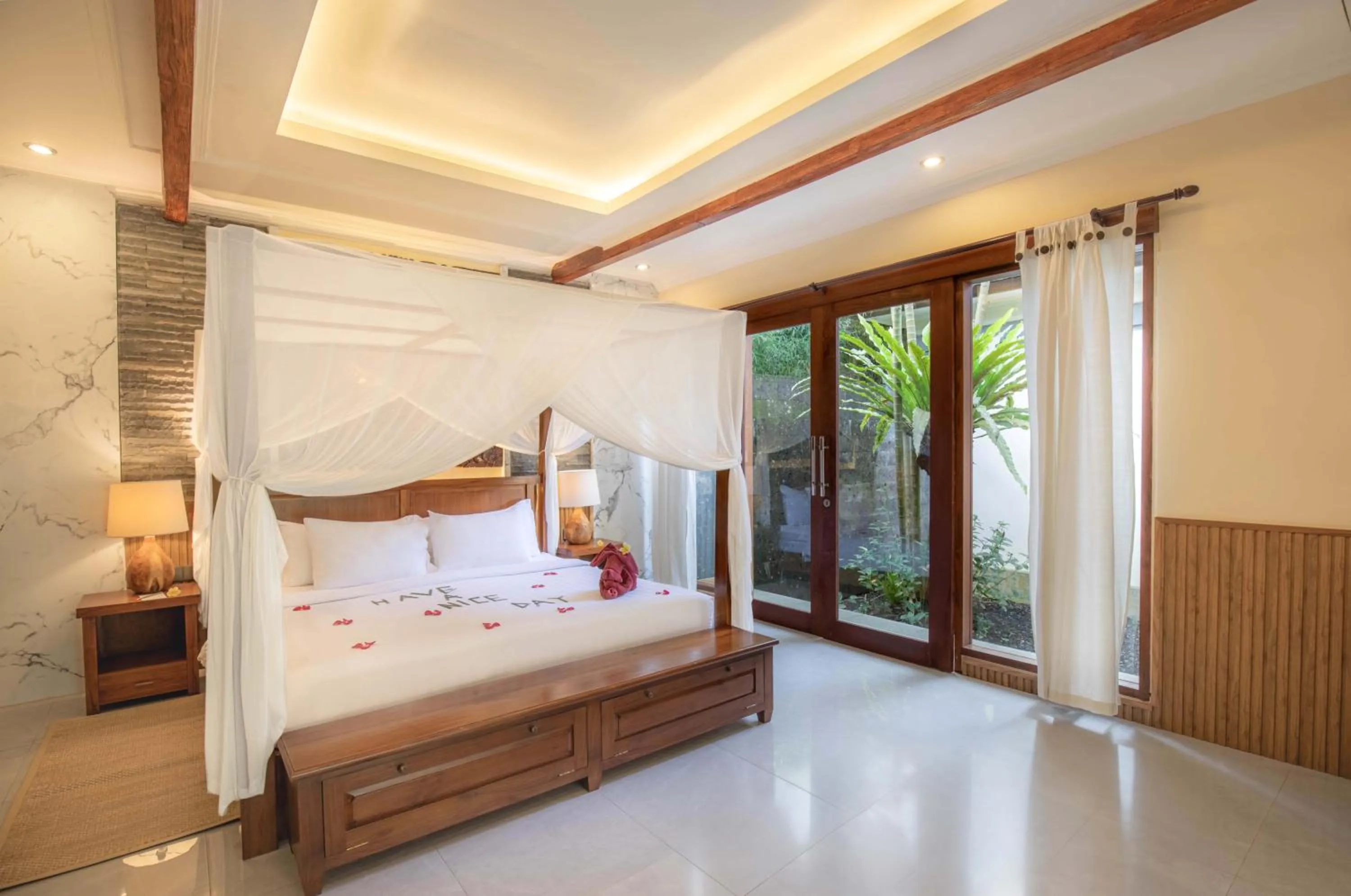 Bed in Suara Air Luxury Villa Ubud