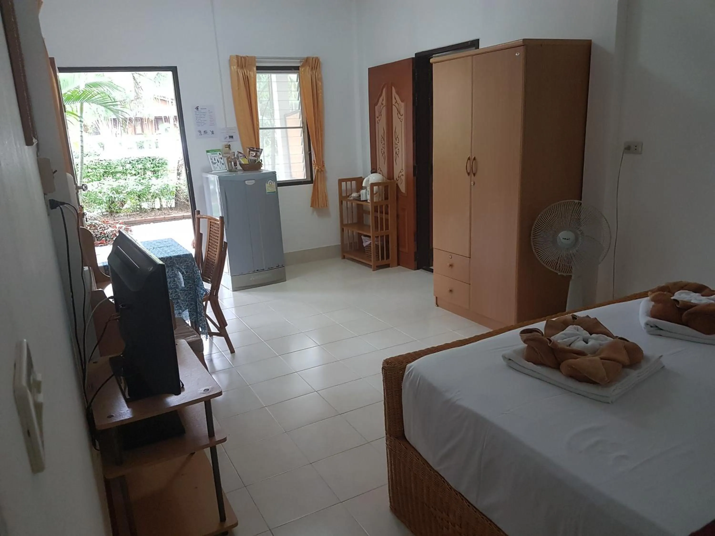 Bed in Jungle Village Bungalow