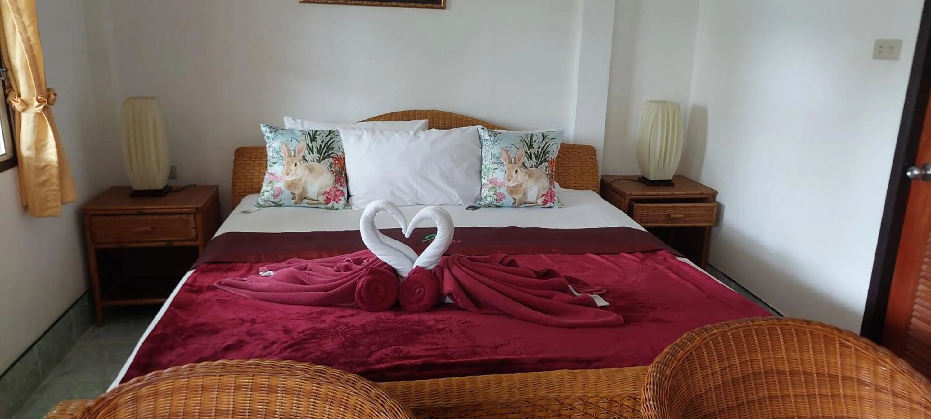 Bed in Jungle Village Bungalow