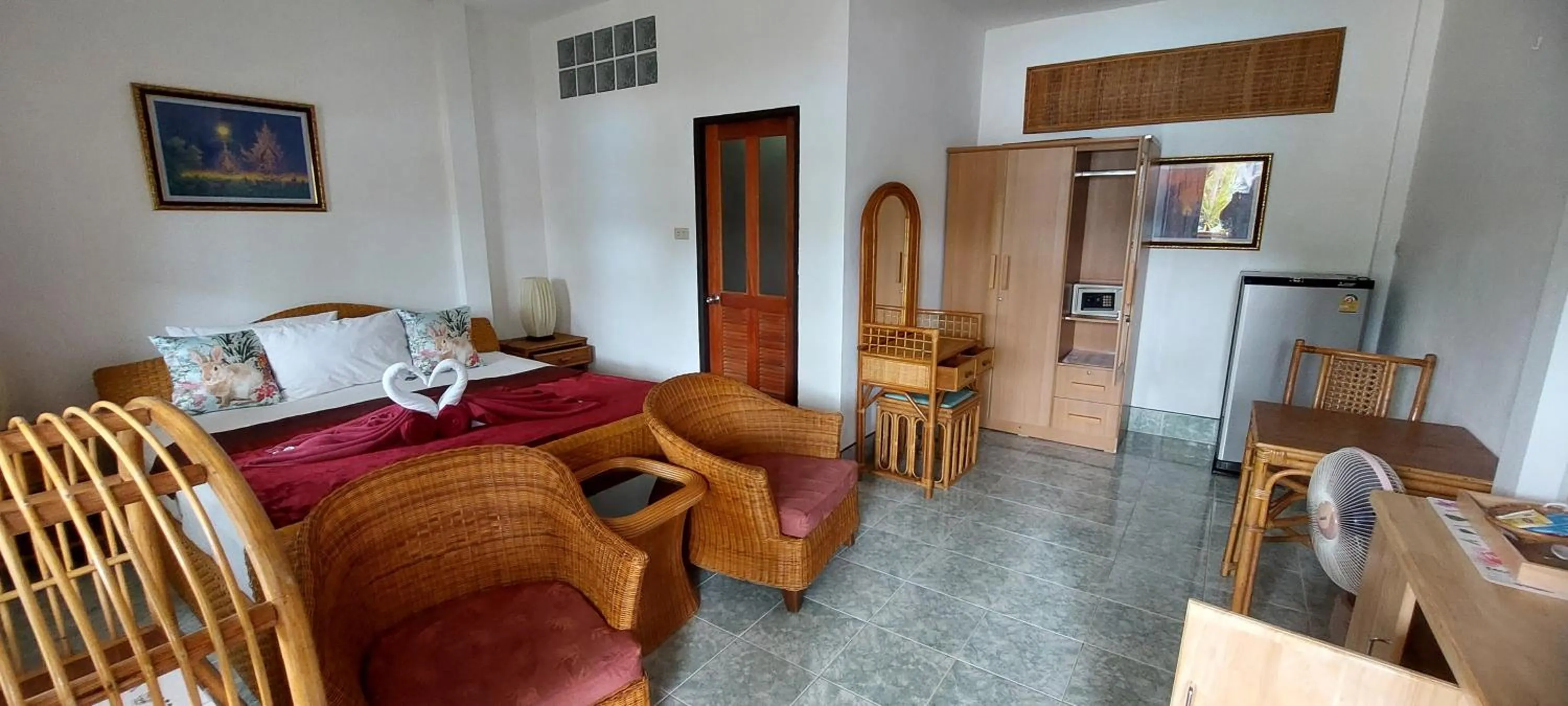 Bed in Jungle Village Bungalow