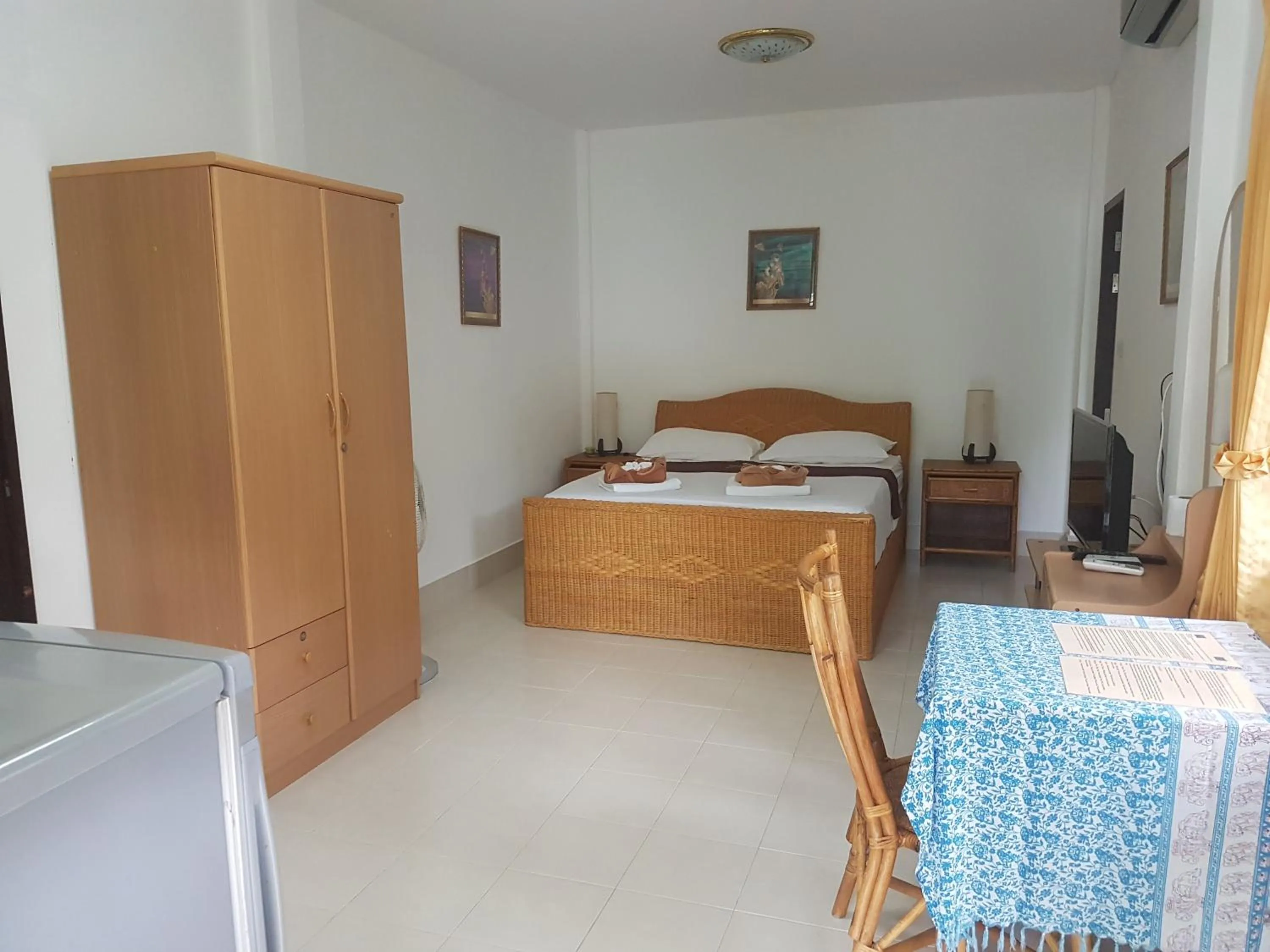 Bed in Jungle Village Bungalow