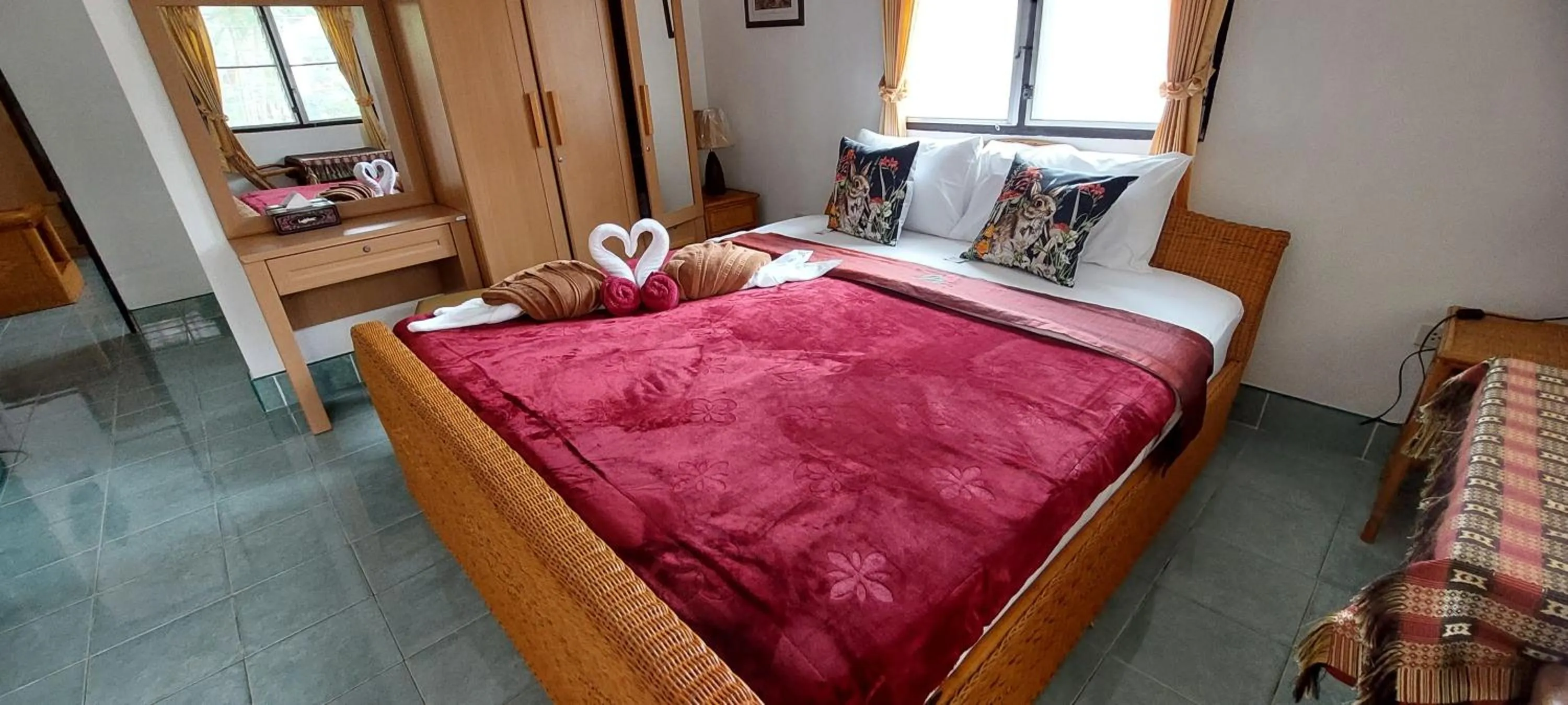 Bed in Jungle Village Bungalow