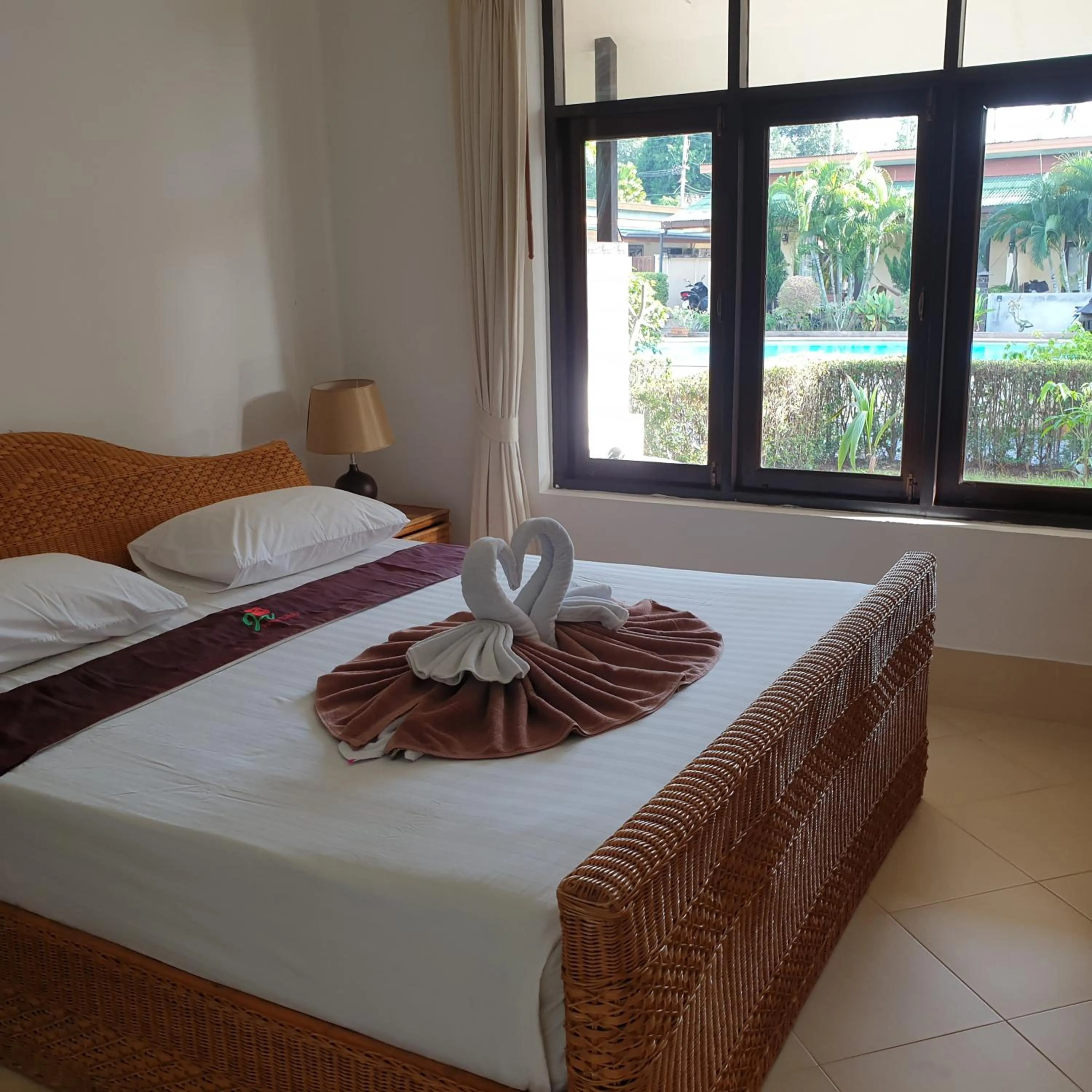 Bed in Jungle Village Bungalow