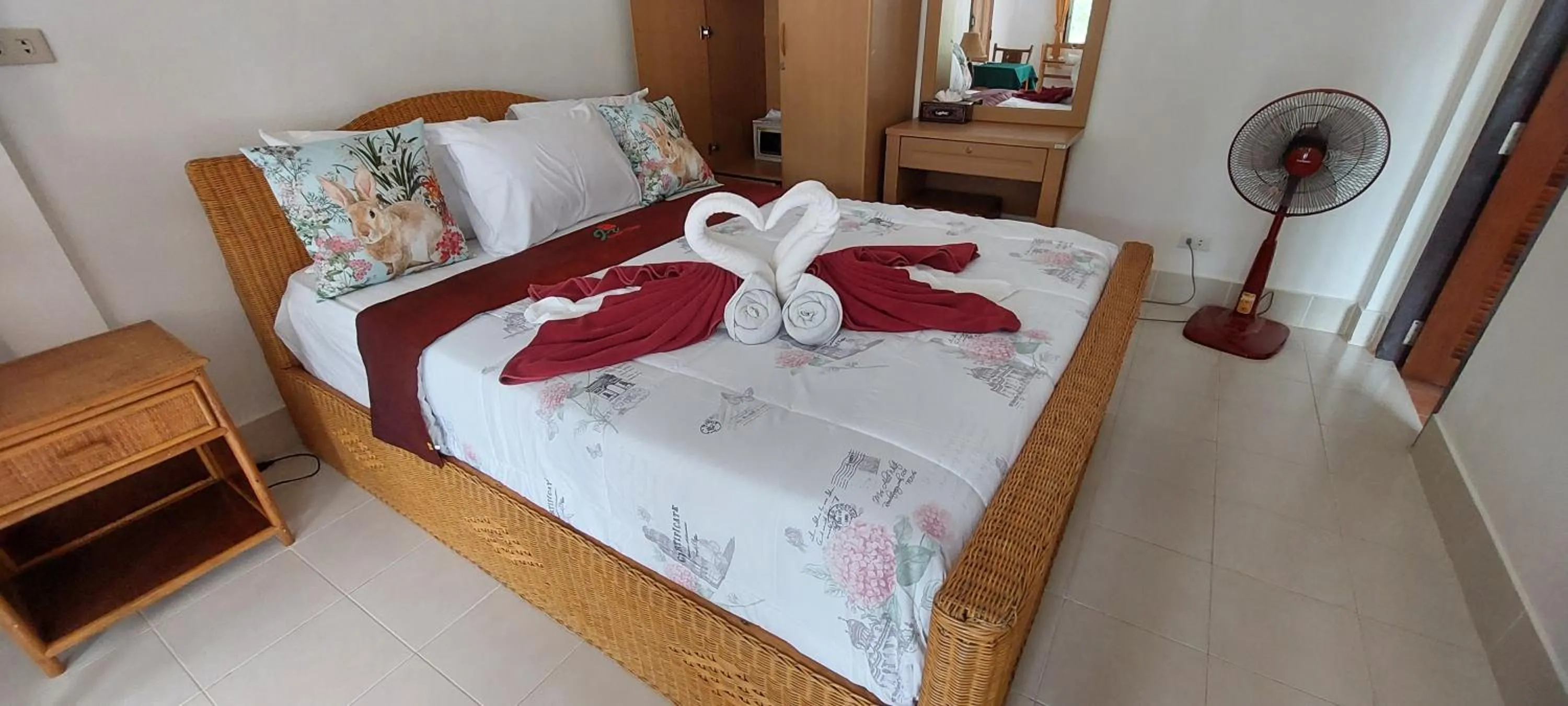 Bed in Jungle Village Bungalow