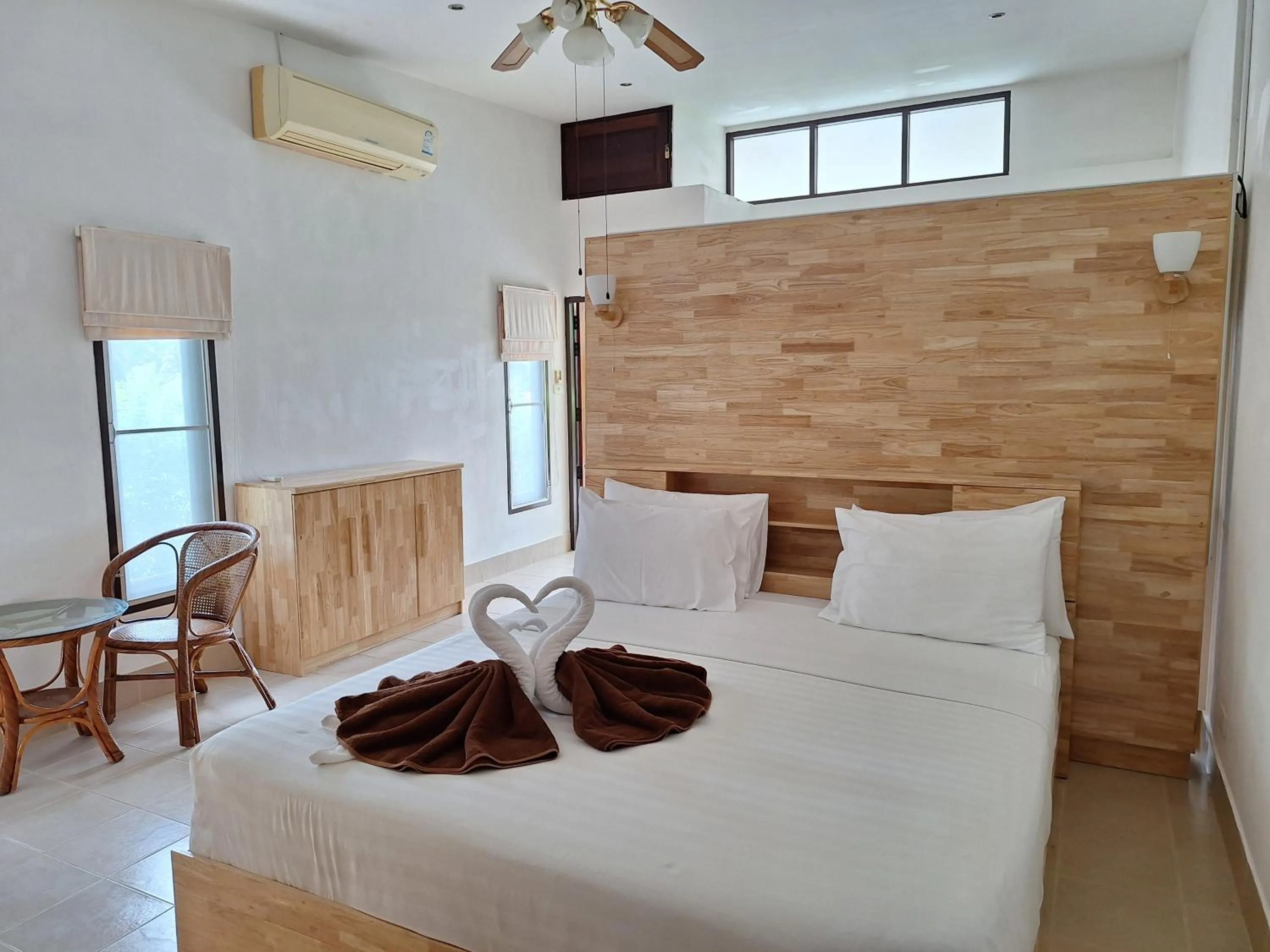 Bed in Jungle Village Bungalow