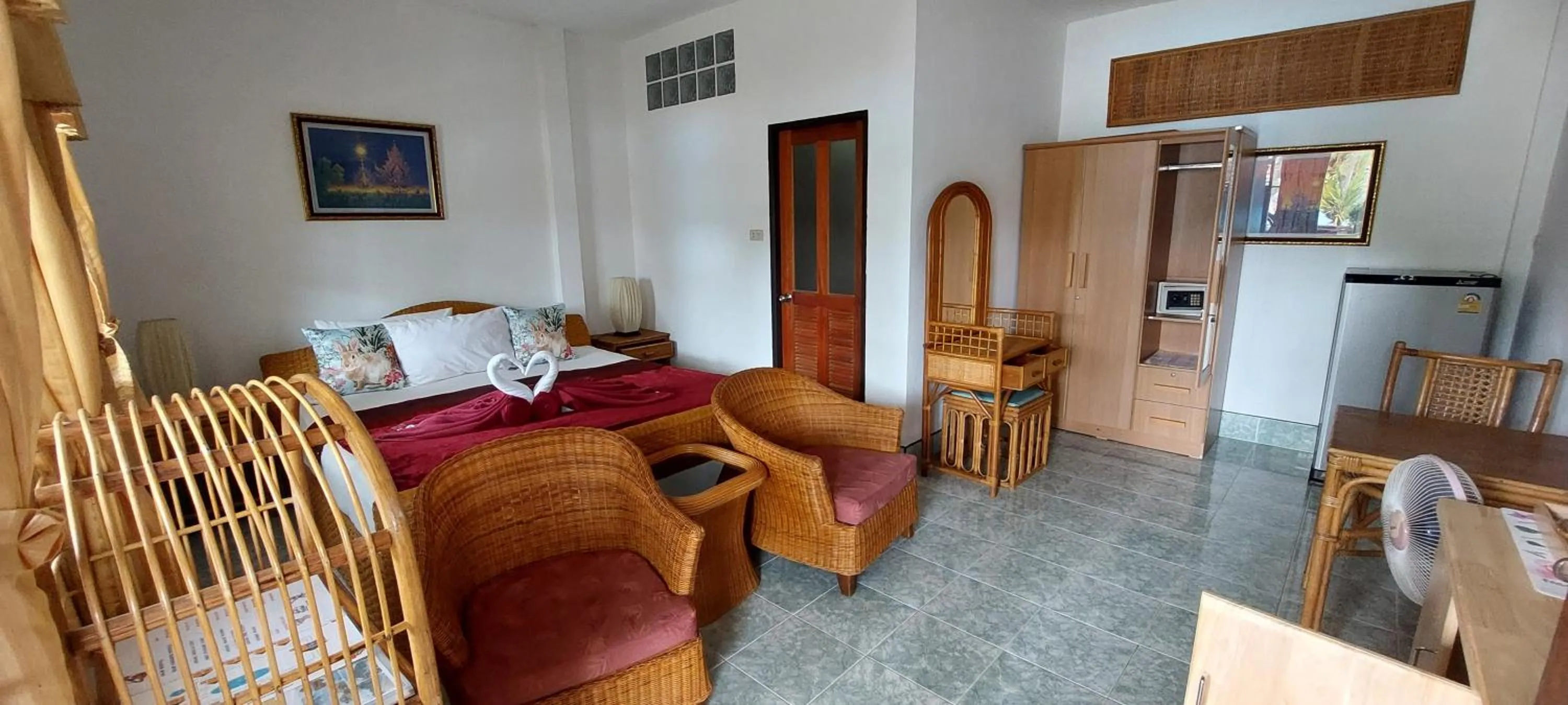 Bed in Jungle Village Bungalow